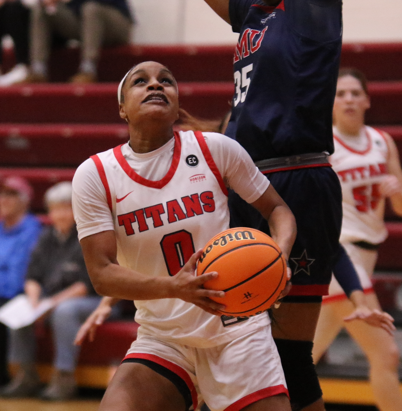 Imani McNeal and the women's basketball team at Detroit Mercy held off Robert Morris, 59-48, in the first round of the Horizon League tournament at Calihan Hall on Tuesday night.