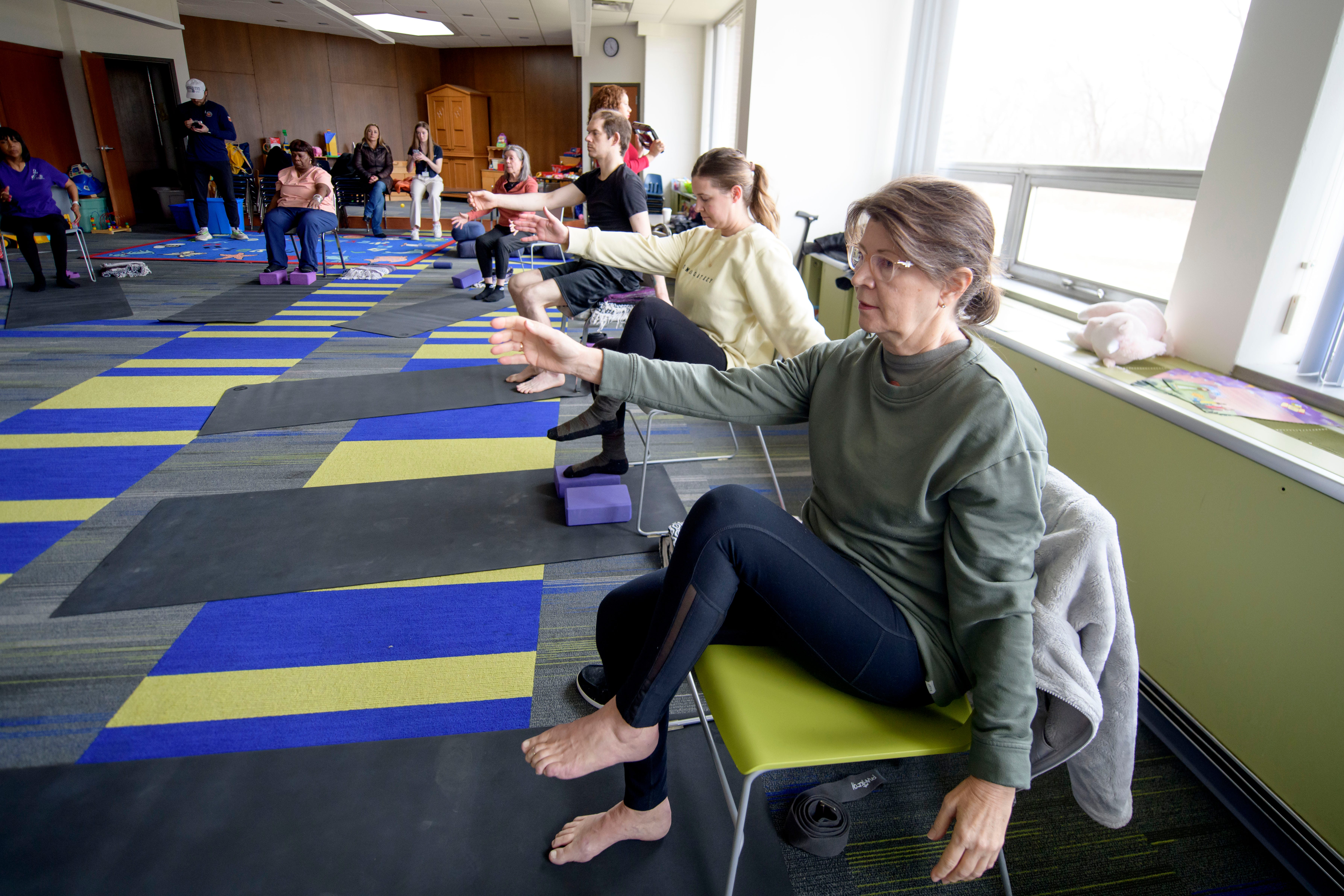 Janet Sandison, of Troy, takes part in a Yoga Moves Parkinson's class, at Congregation Shaarey Zedek, March 6, 2024. The Kirk Gibson Foundation started the program to offer free yoga classes specifically designed to help people living with Parkinson's Disease.