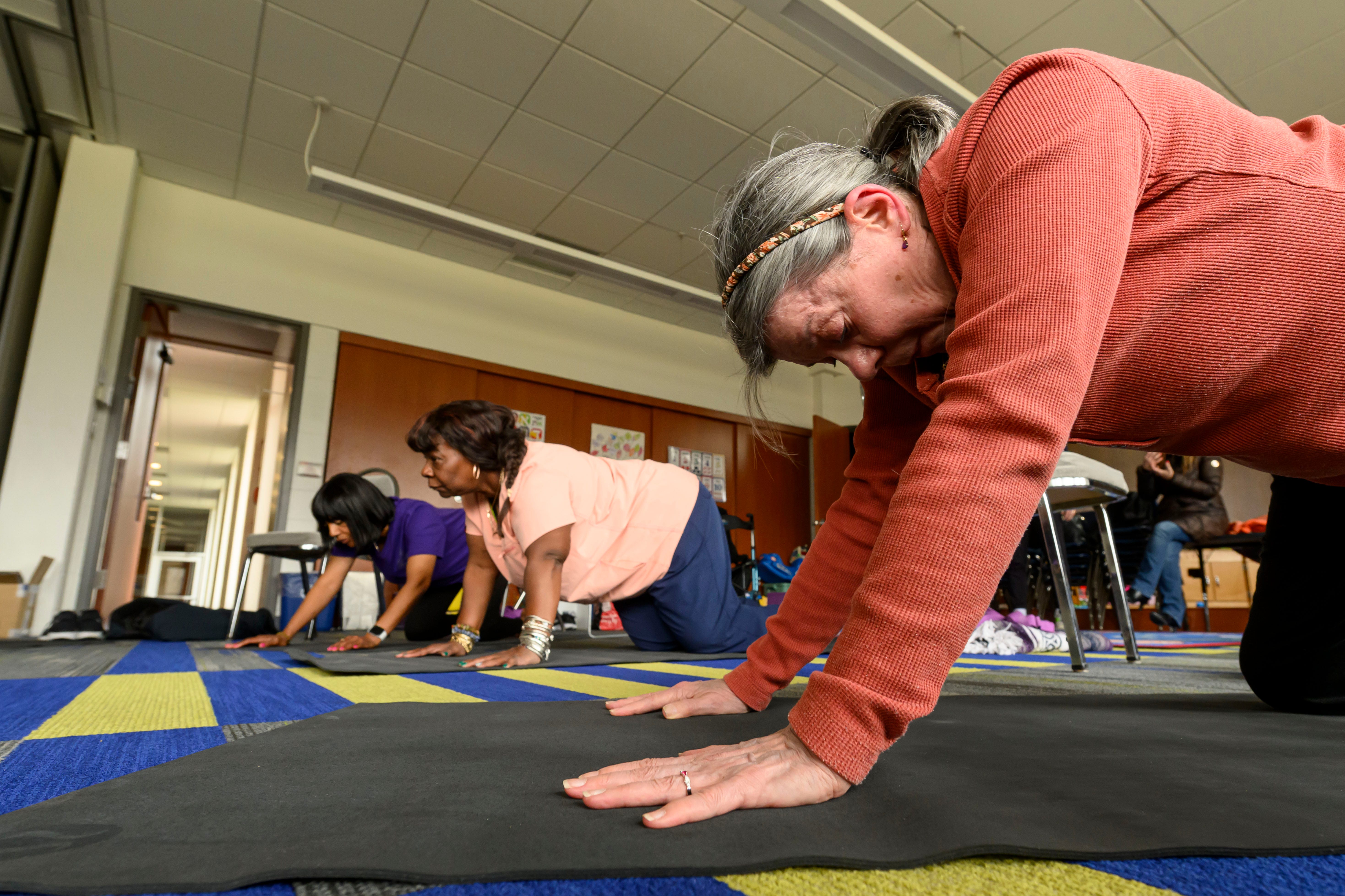 Barbara Perry, of Southfield, takes part in a Yoga Moves Parkinson's class, at Congregation Shaarey Zedek, March 6, 2024. The Kirk Gibson Foundation started the program to offer free yoga classes specifically designed to help people living with Parkinson's Disease.