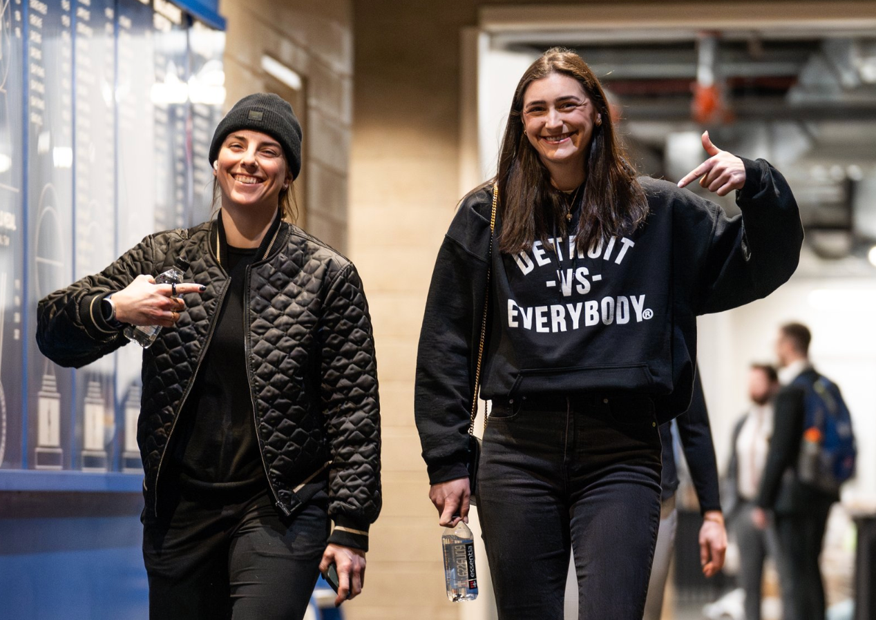 Farmington's Megan Keller, right, and Hilary Knight arrive at Little Caesars Arena before Boston's 2-1 shootout win against Ottawa in a Professional Women's Hockey League game on Saturday.
