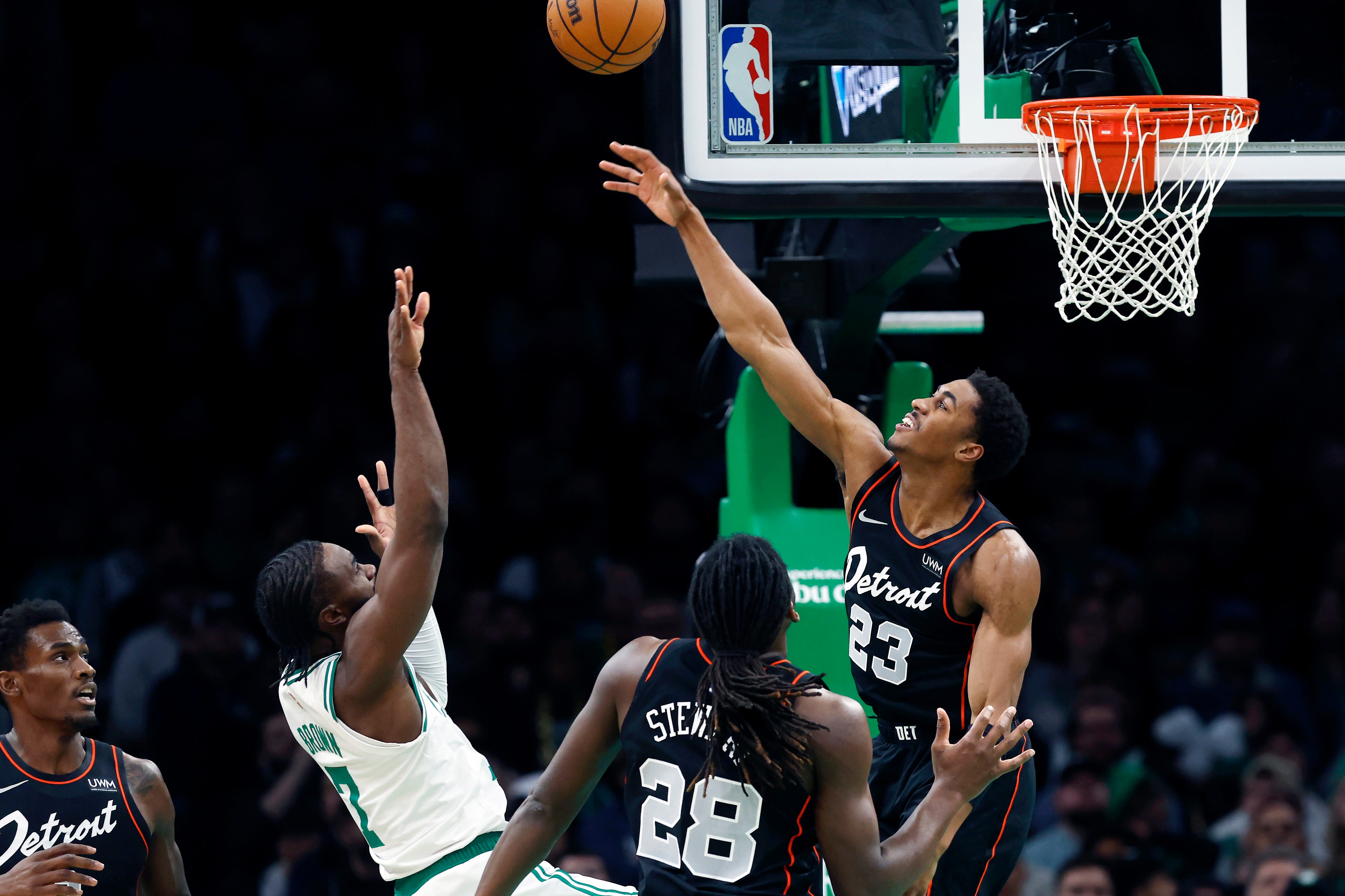 Boston Celtics' Jaylen Brown (7) shoots against Detroit Pistons' Jaden Ivey (23) during the first half.