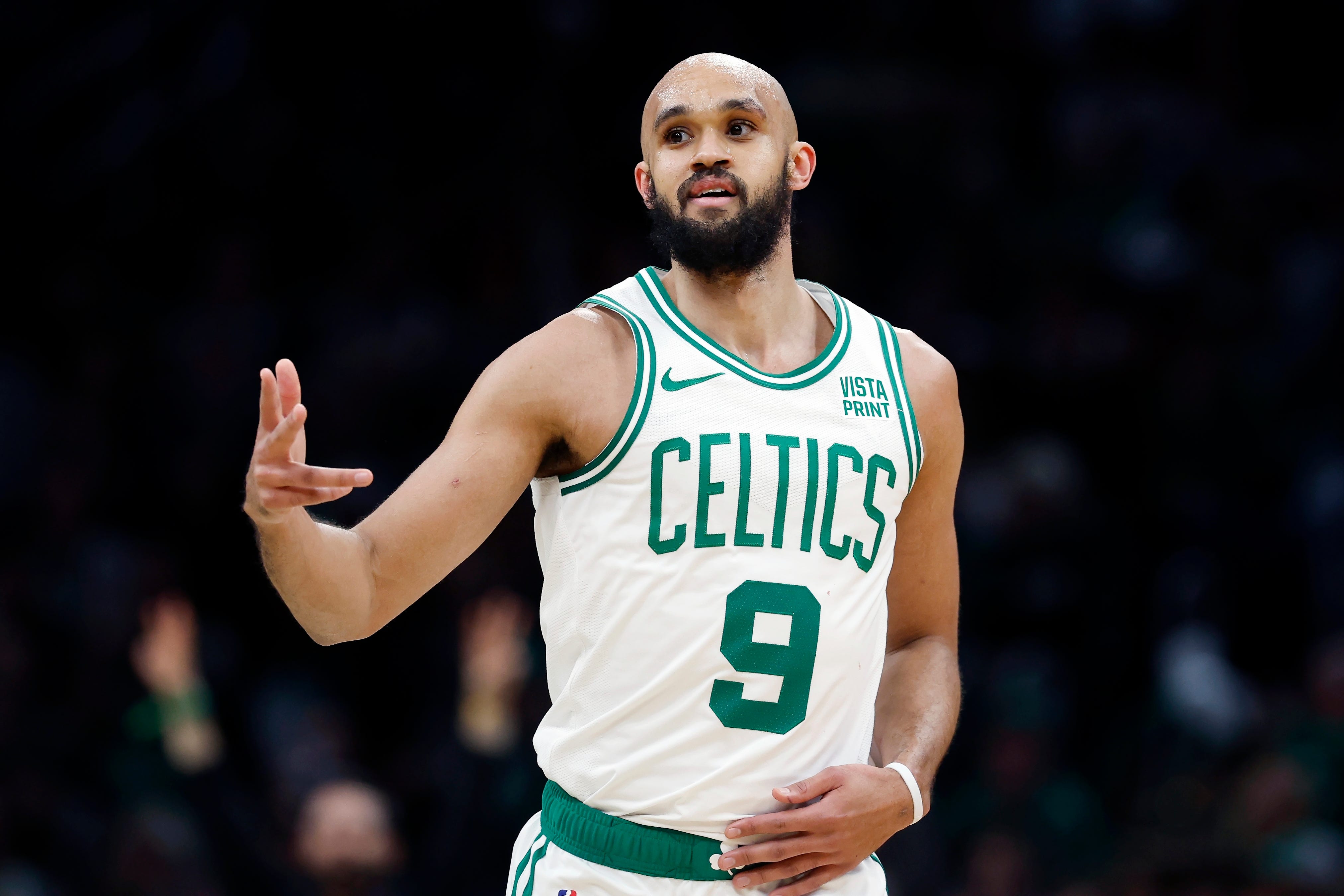 Boston Celtics' Derrick White reacts after making a 3-pointer during the first half.