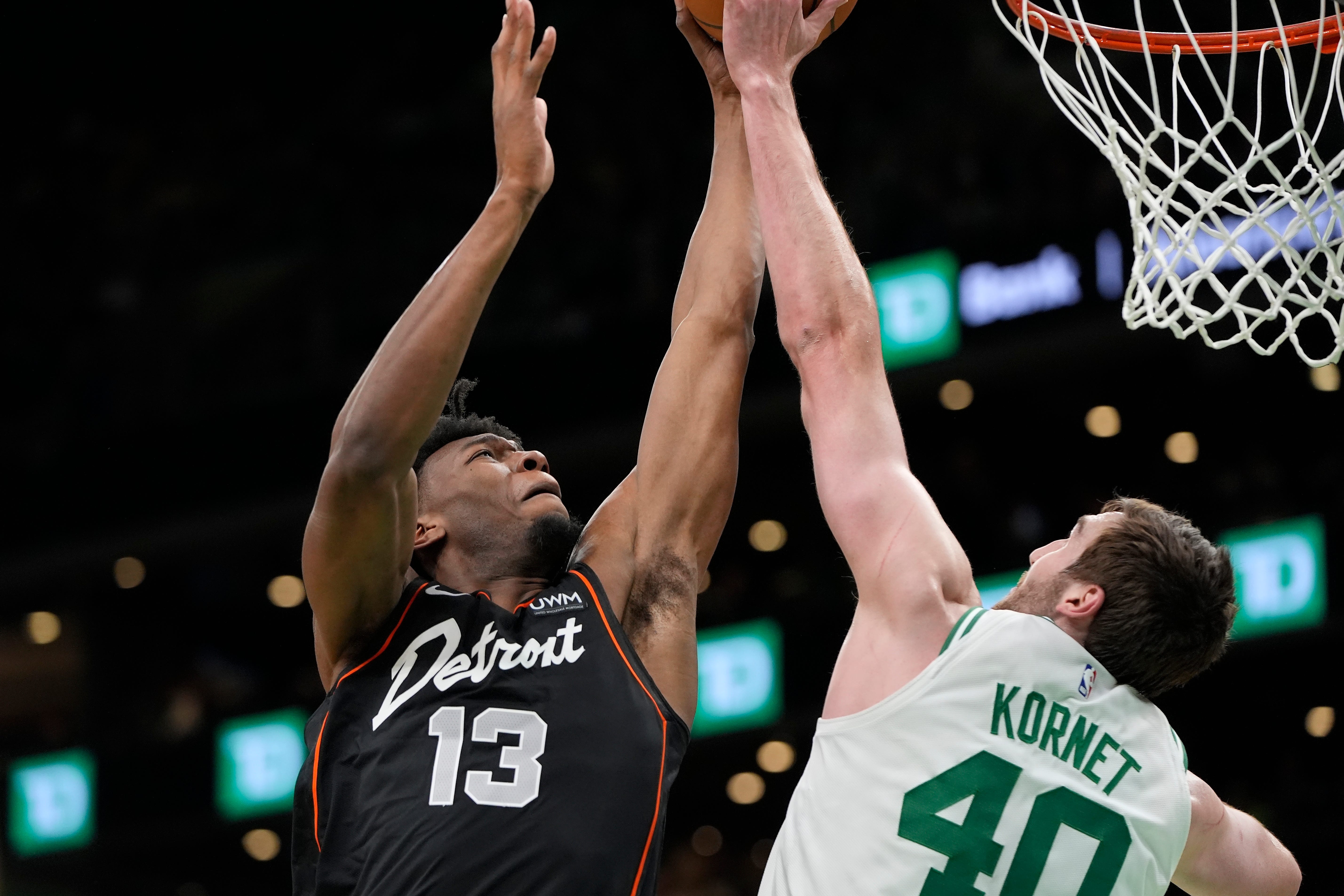 Detroit Pistons' James Wiseman (13) shoots against Boston Celtics' Luke Kornet (40) during the first half.