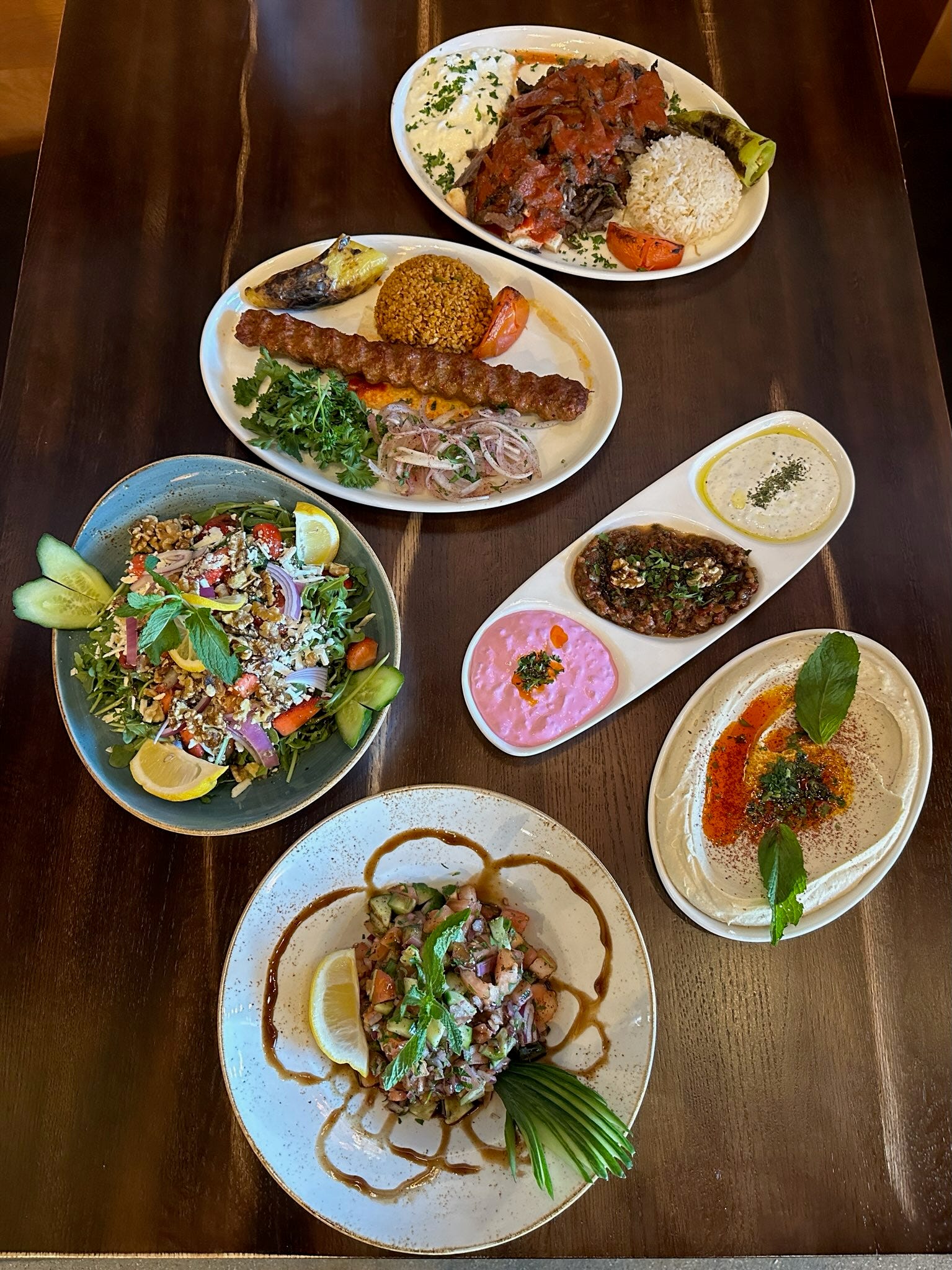 Salads, appetizers and meat entrees from Turkish Village, a new restaurant open now in Dearborn.