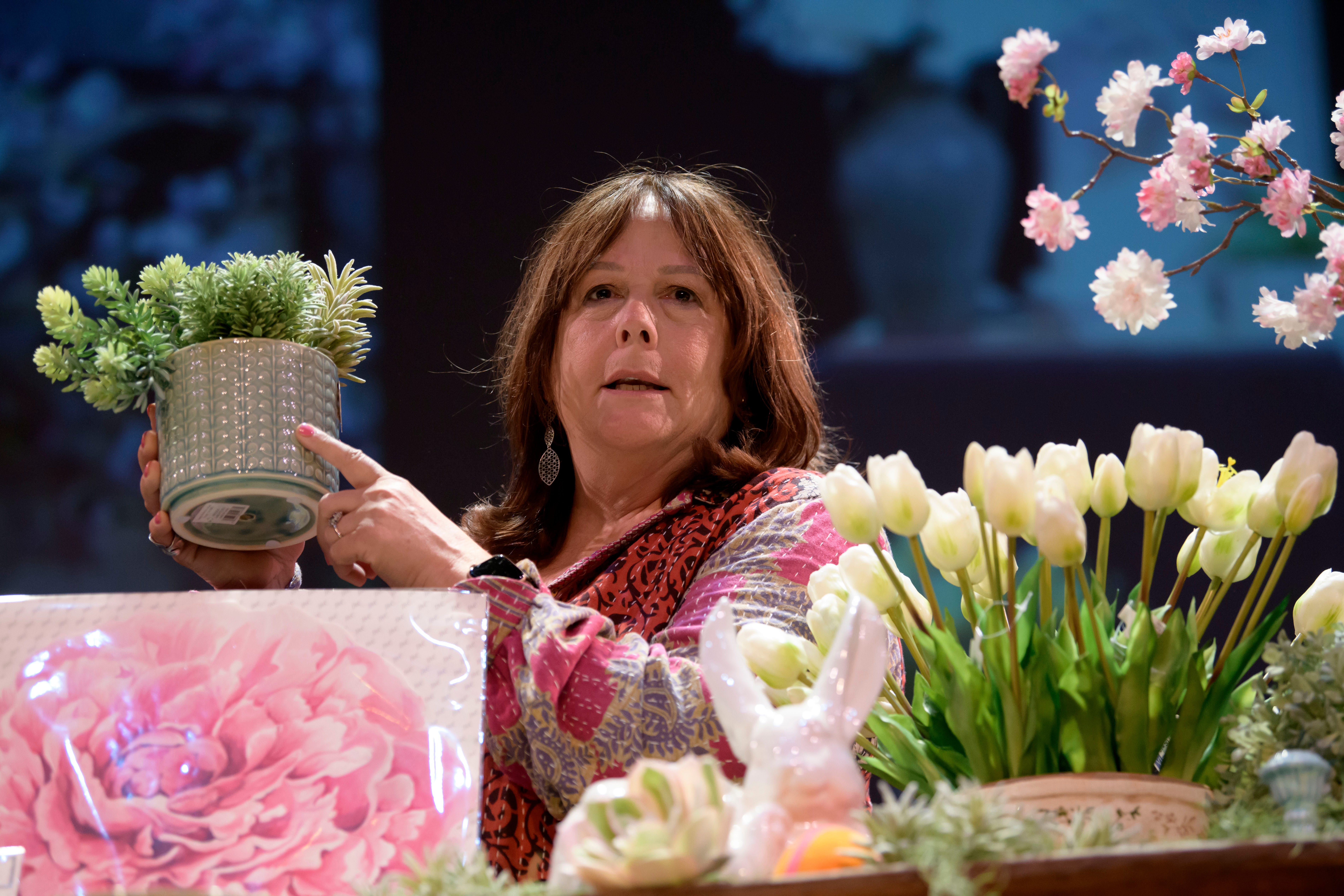 Carol Peretto, of Gardenviews at Home, discusses options for a spring collection of flowers and home design ideas during the event series Dish and Design, at the Berman Center for Performing Arts, in West Bloomfield, March 20, 2024.