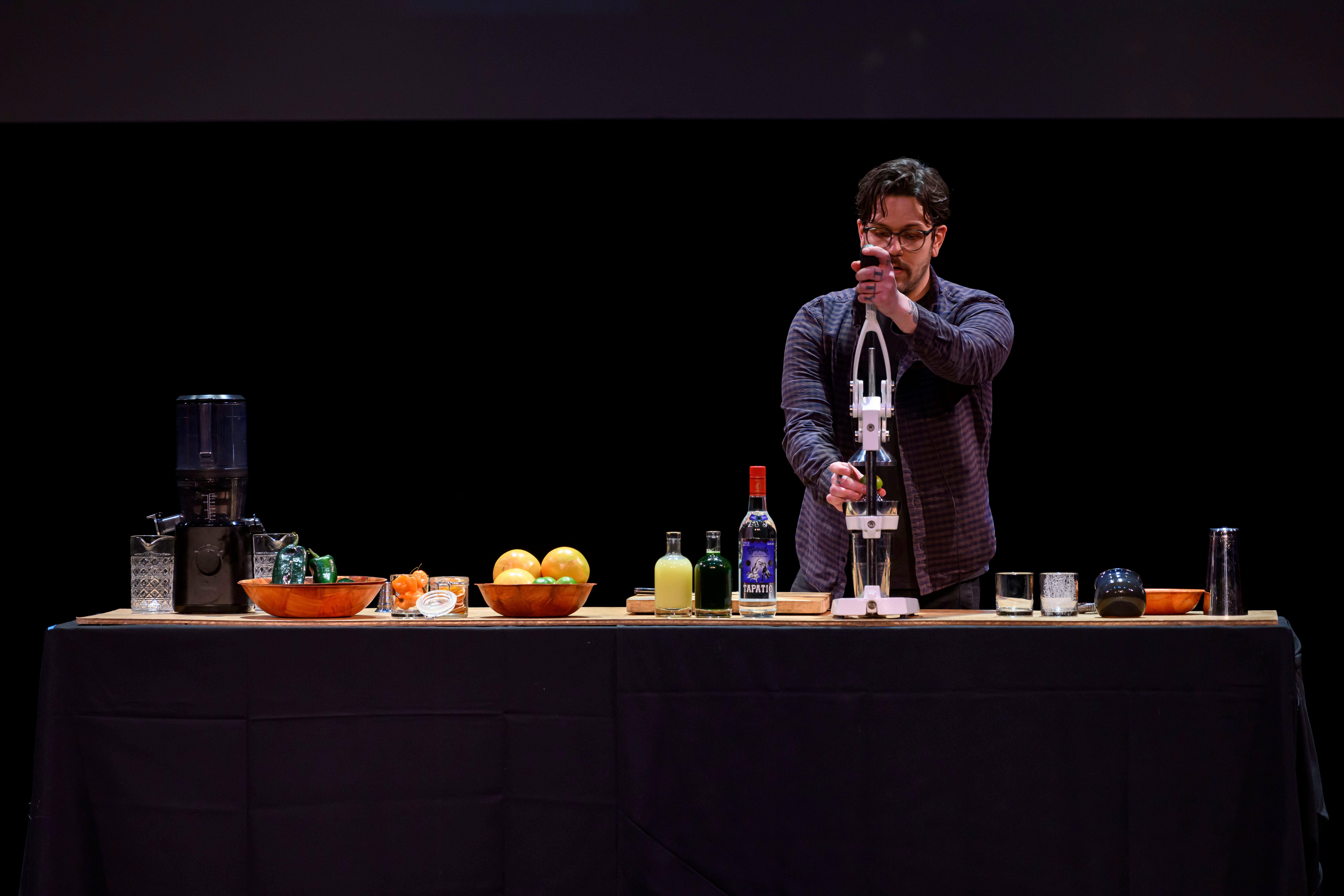 Kyle Marks, of Metropolitan Bar and Kitchen, demonstrates how to make poblano margaritas during the event series Dish and Design, at the Berman Center for Performing Arts, in West Bloomfield, March 20, 2024.