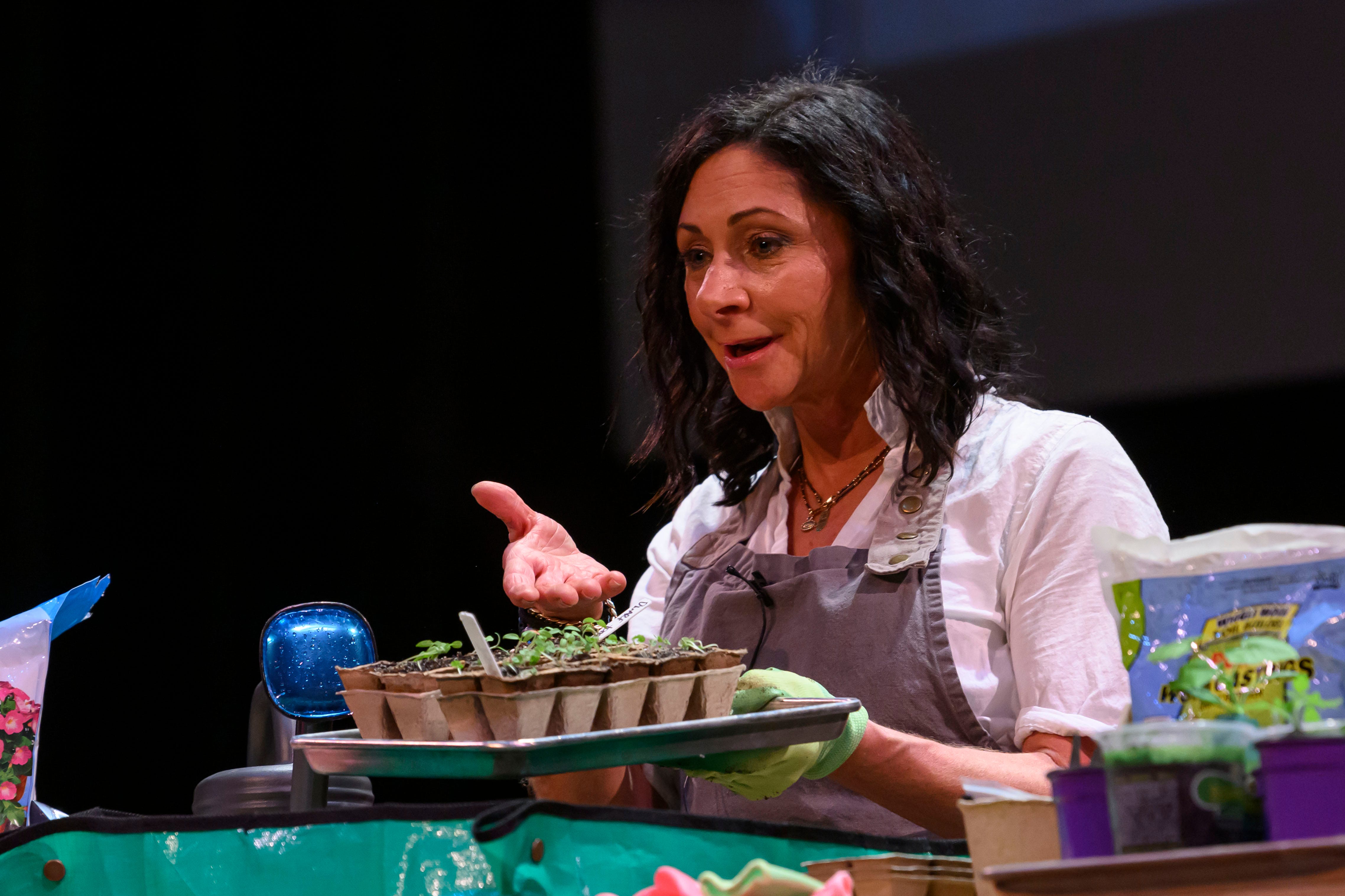 Gardener Michelle Kobernick demonstrates how to germinate seeds during the event series Dish and Design, at the Berman Center for Performing Arts, in West Bloomfield, March 20, 2024.