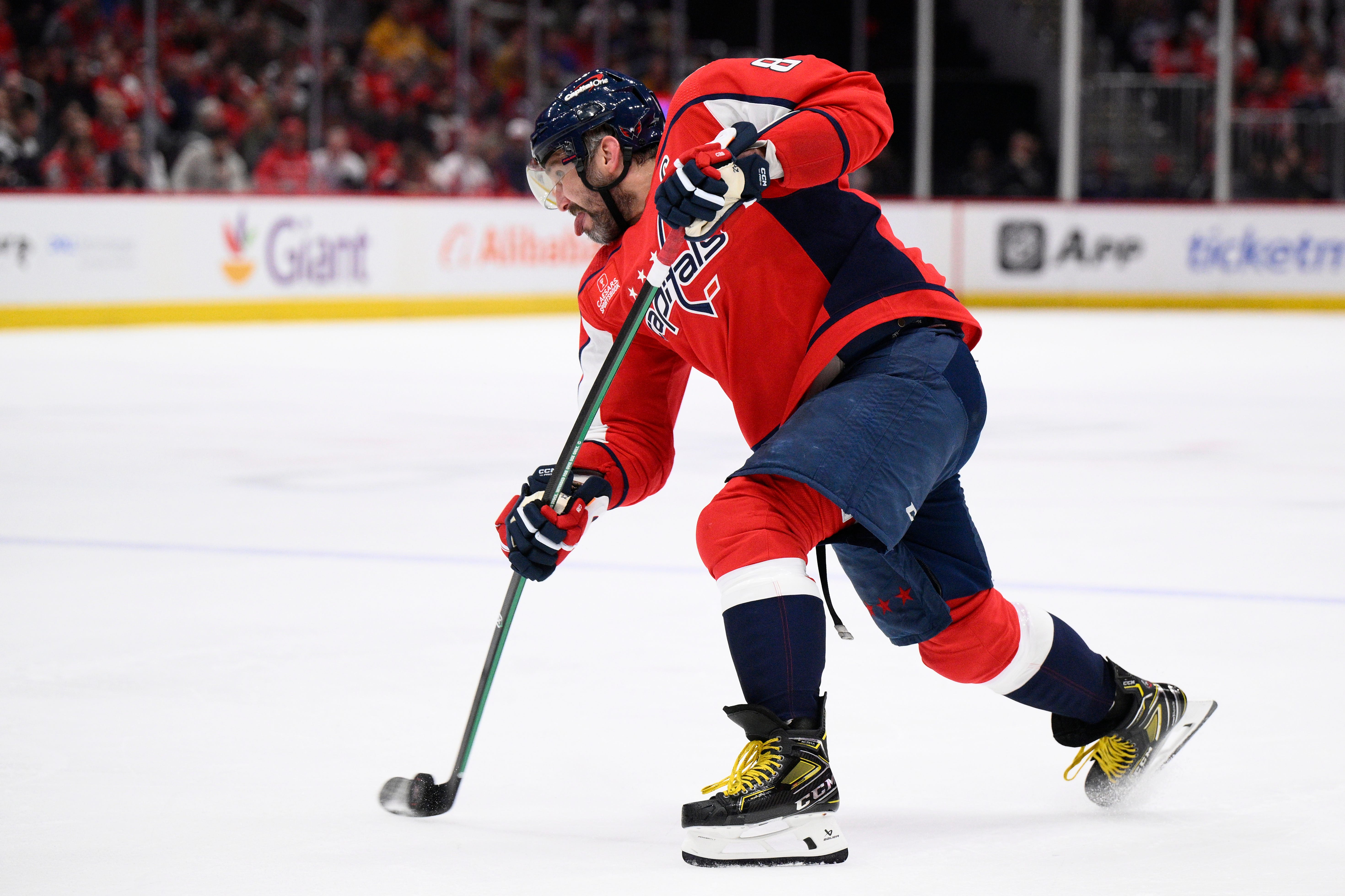 Washington Capitals left wing Alex Ovechkin (8) shoots the puck during the first period.