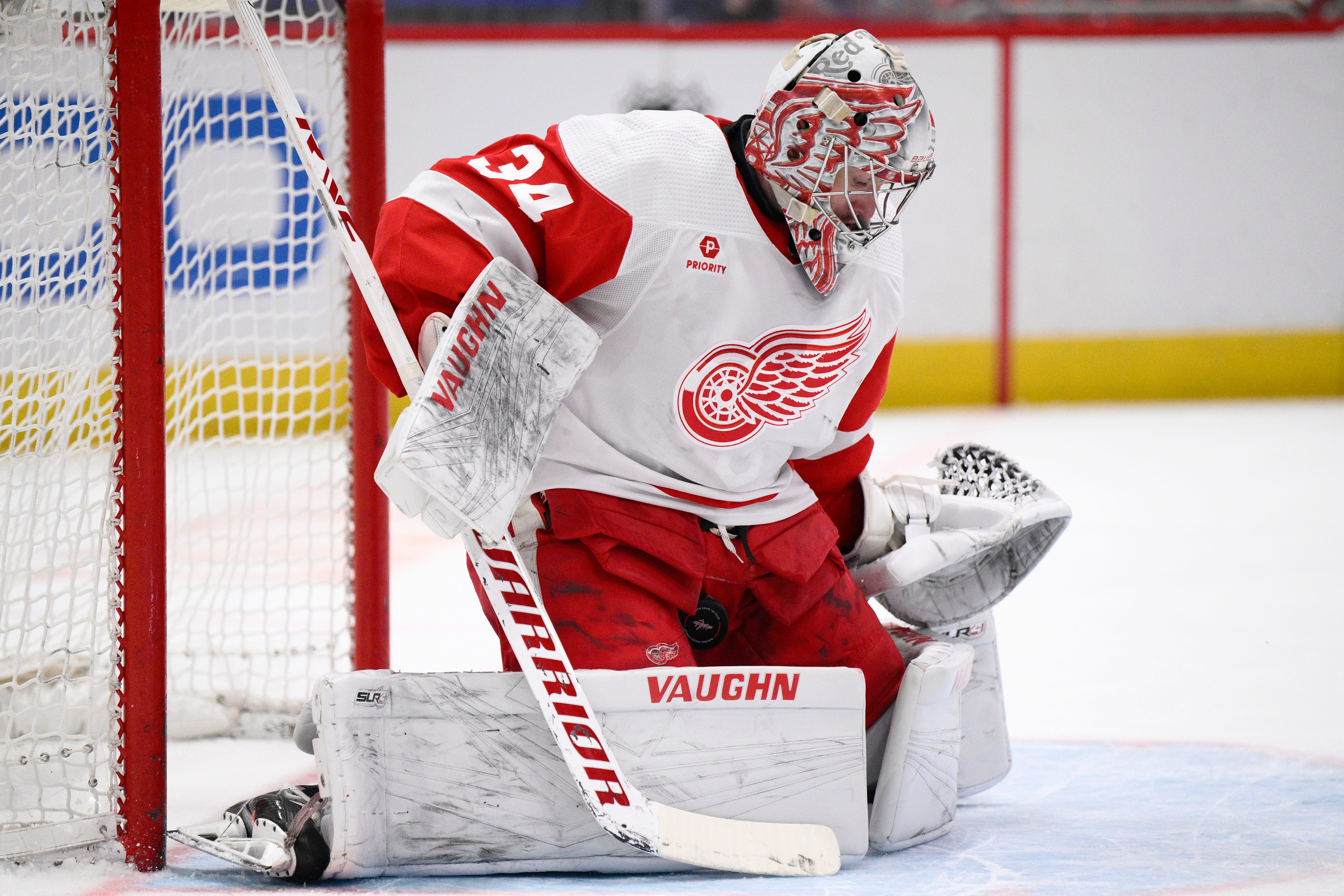 Detroit Red Wings goaltender Alex Lyon (34) stops the puck during the first period.