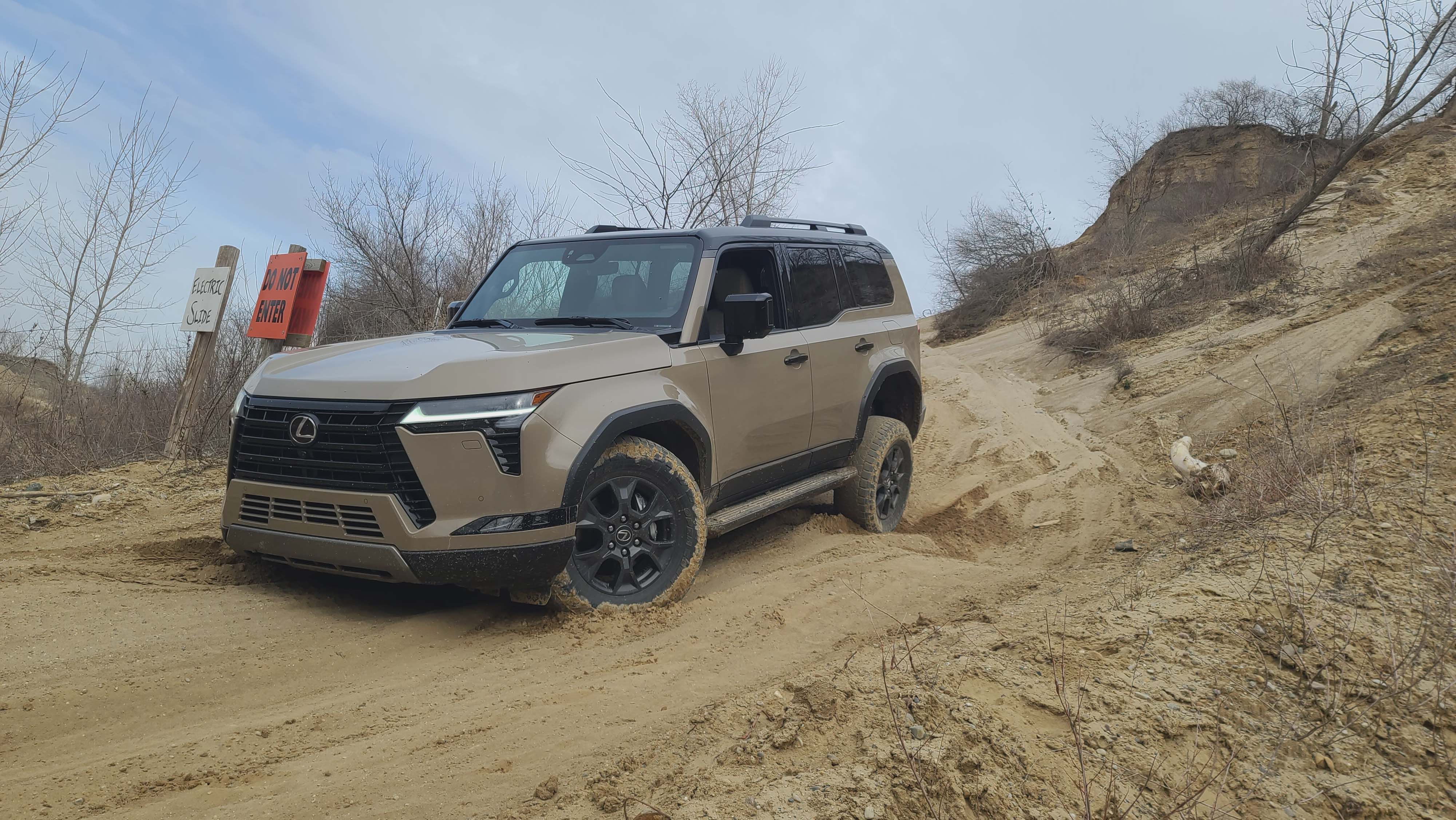 The 2024 Lexus GX 550 4WD shows off its impressive suspension articulation as it navigates Holly Oaks ORV Park.