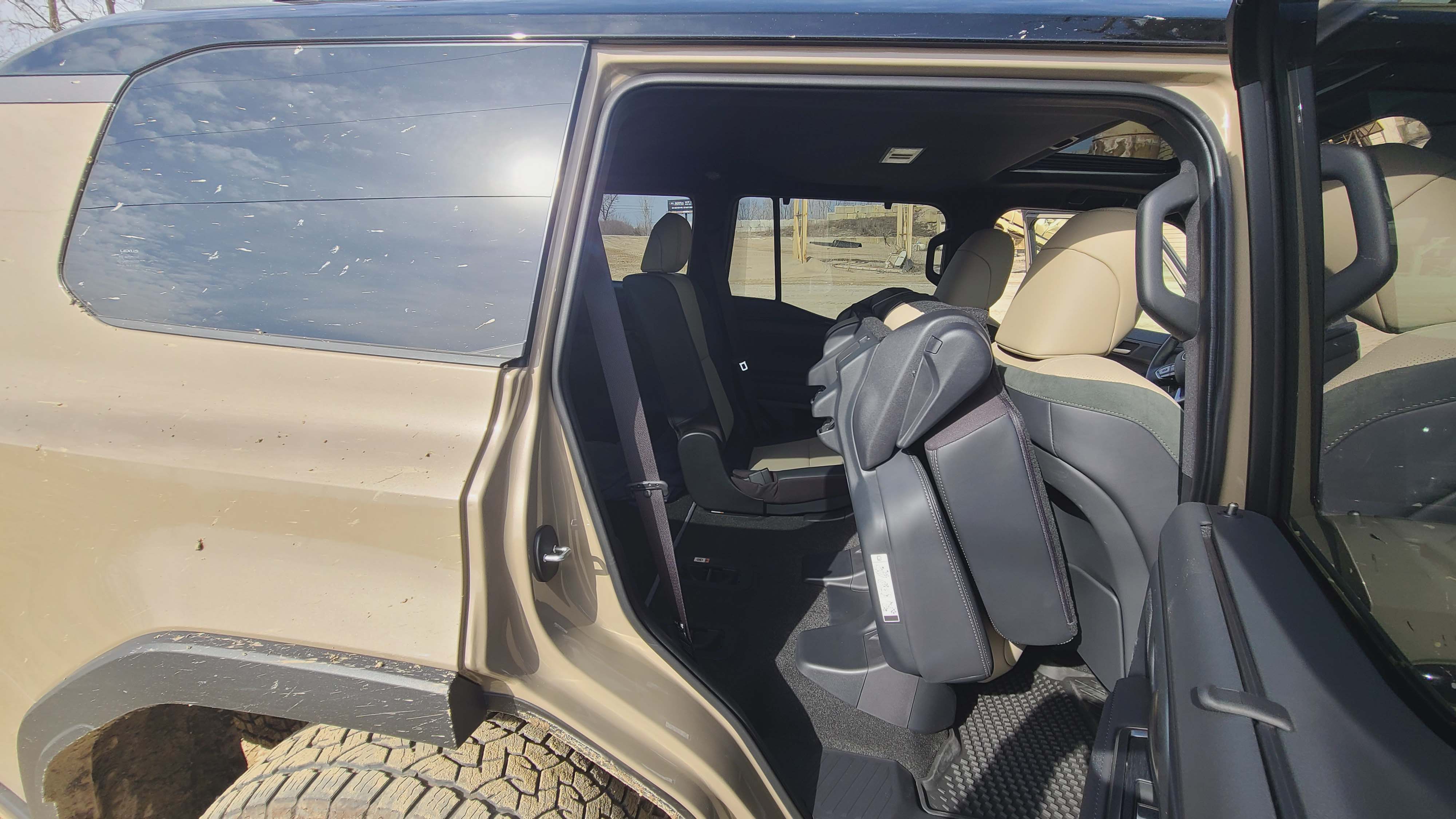 The rear seats of the 2024 Lexus GX 550 4WD flip forward for easy rear access.