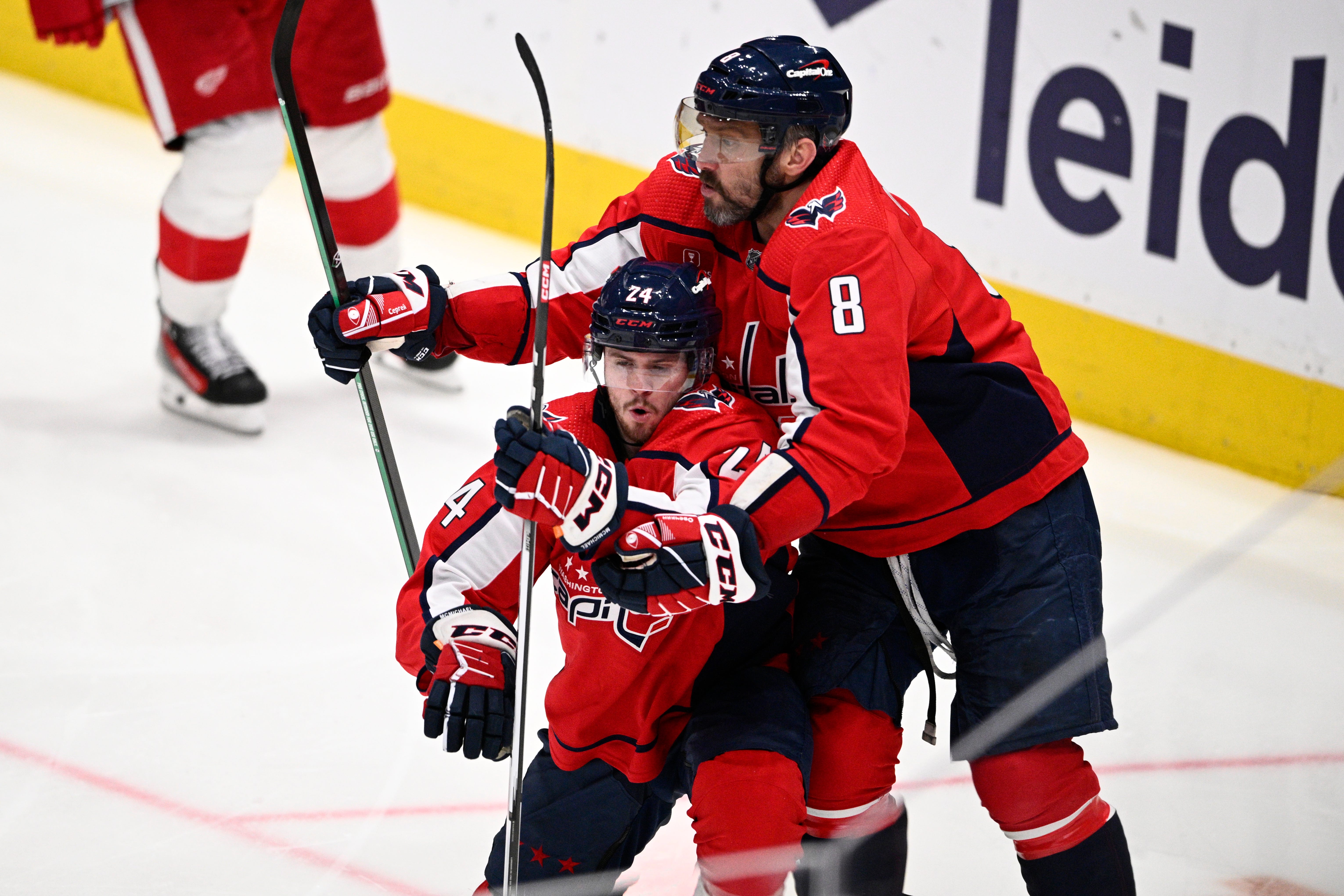 Washington Capitals center Connor McMichael (24) celebrates his goal with left wing Alex Ovechkin (8) during the third period.