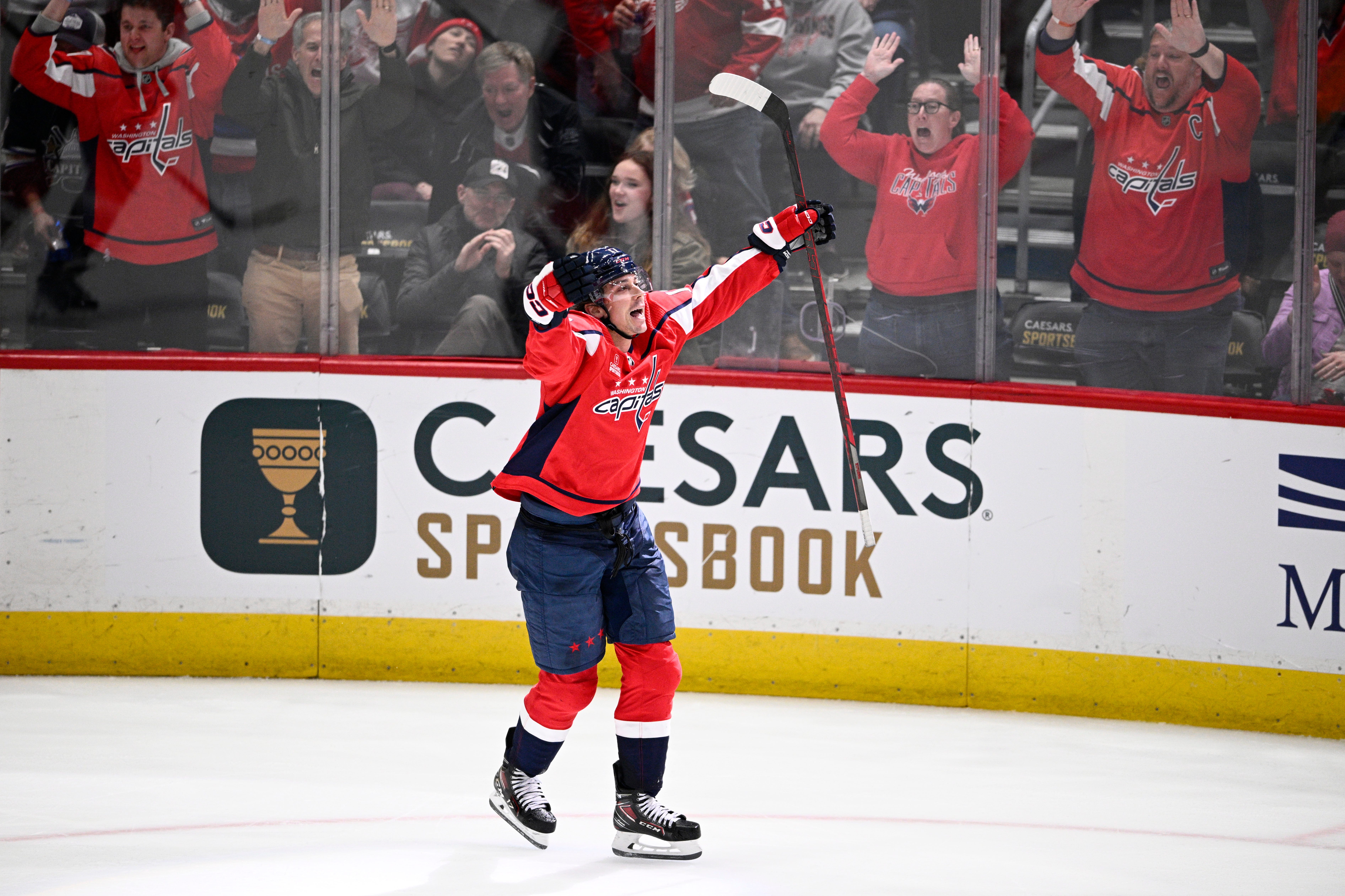 Washington Capitals center Dylan Strome (17) celebrates his game-winning goal during overtime of an NHL hockey game against the Detroit Red Wings, Tuesday, March 26, 2024, in Washington. The Capitals won 4-3 in overtime.