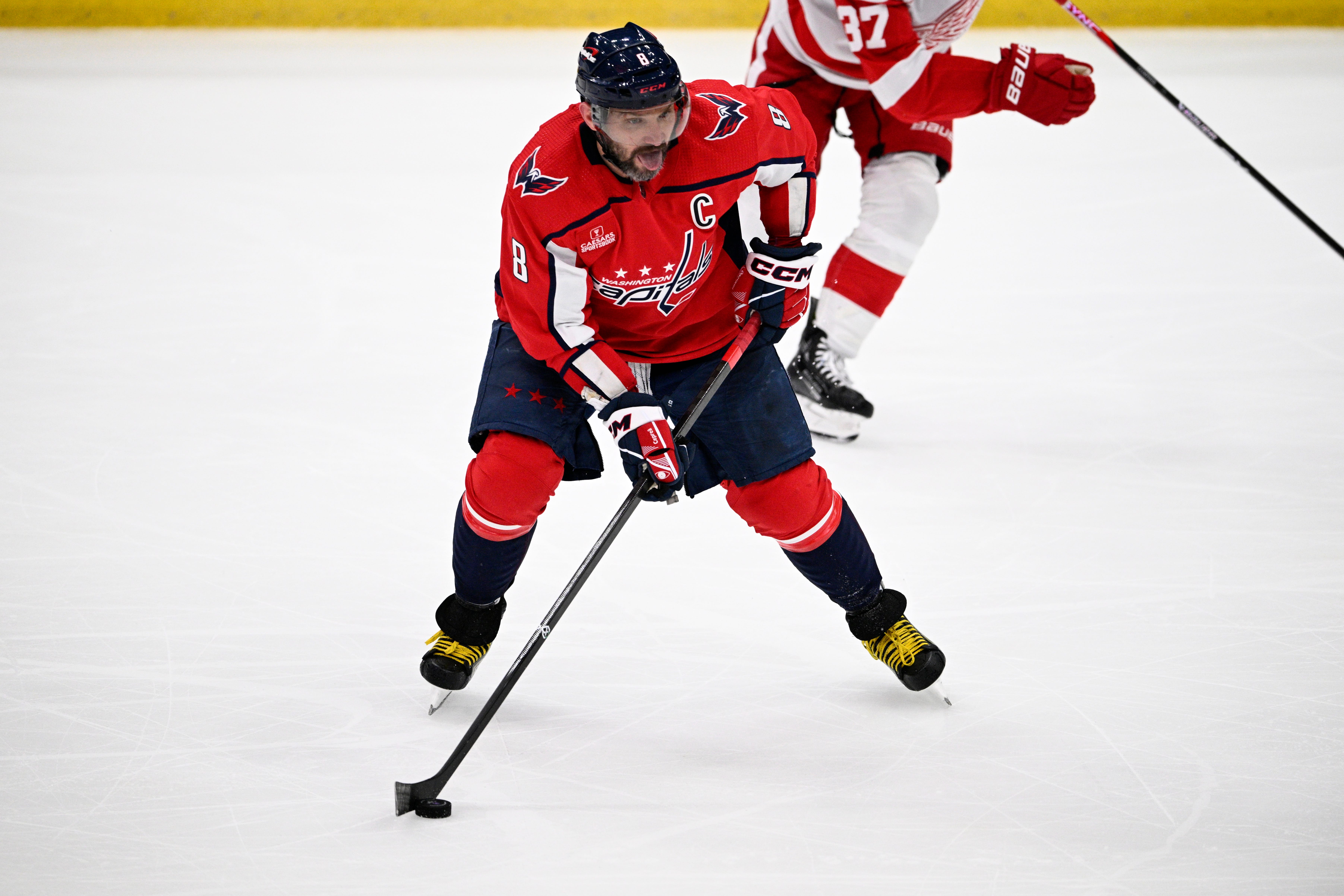 Washington Capitals left wing Alex Ovechkin (8) skates with the puck during the third period.