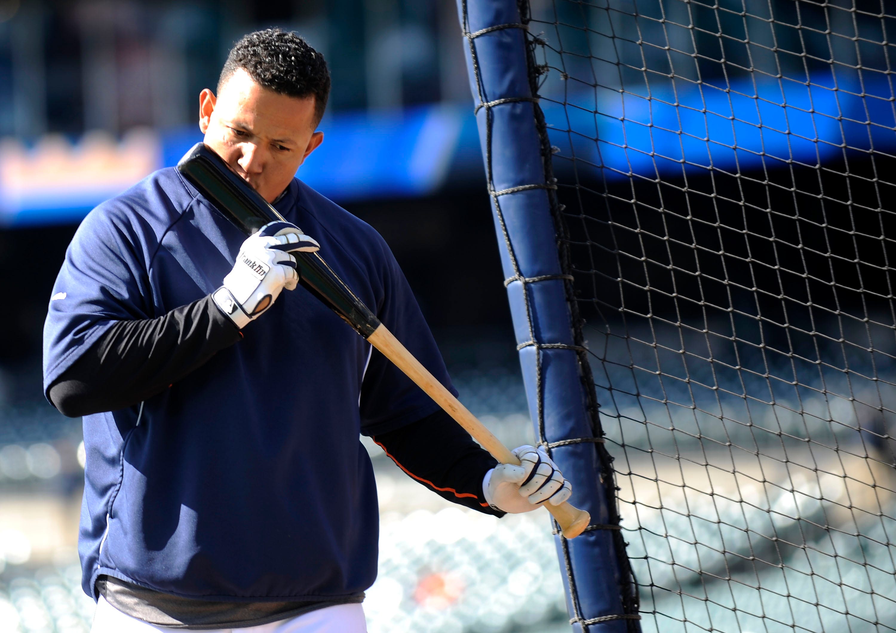Tigers' Miguel Cabrera kisses his bat during batting practice before Monday's season opener against Kansas City Royals. Photos of Detroit Tigers Opening Day on Monday, March 31, 2014 at Comerica Park in Detroit.