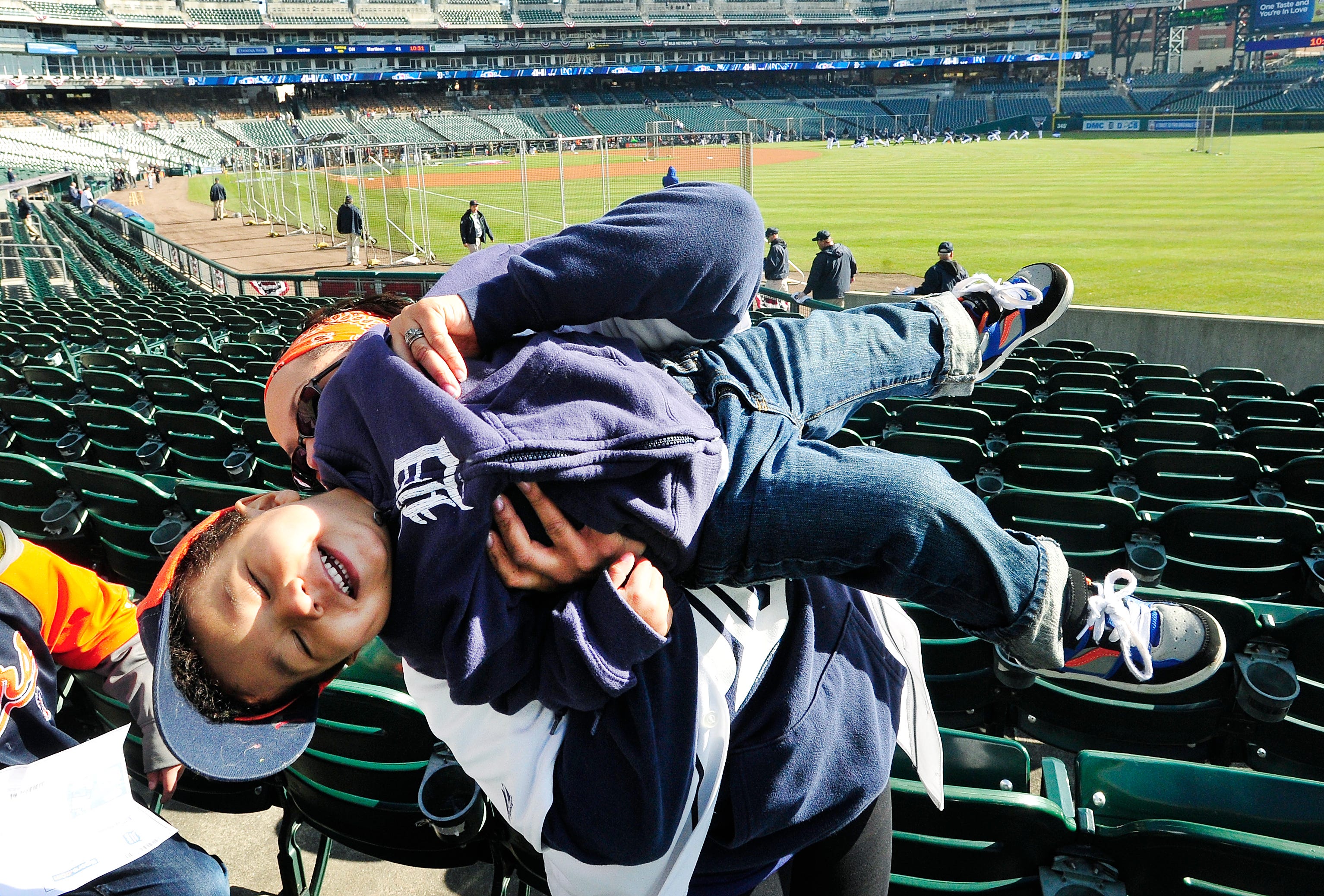 Adam Canedo, 2, enjoys his first Detroit Tigers Opening Day with his mother Crystal Canedo out in the stands down the first base line. Detroit Tigers Opening Day vs the Kansas City Royal at Comerica Park in Detroit, Michigan on March 31, 2014.