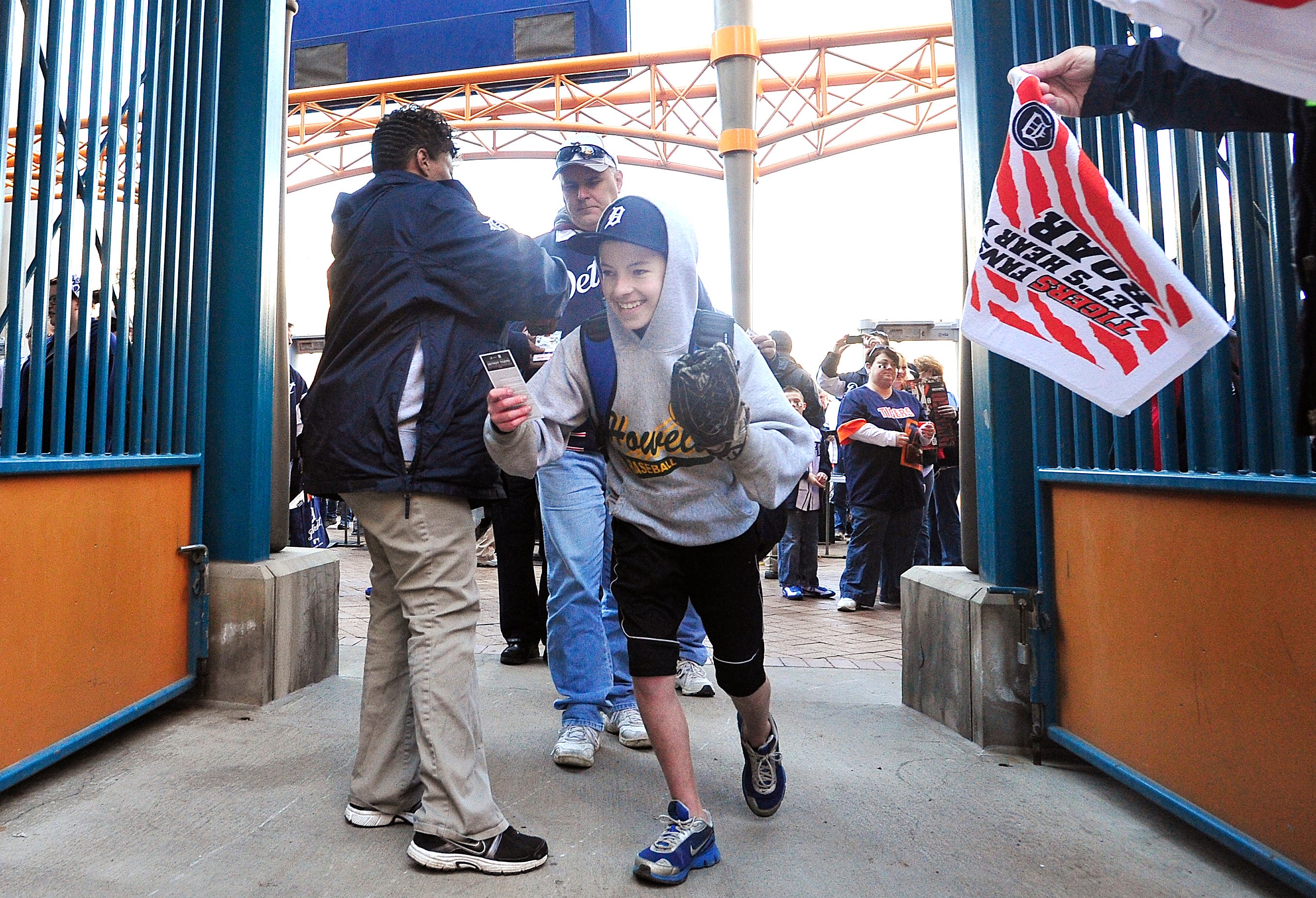 Allen Couet, 14 is one of the first to get into the gates at Comerica Park for the Opening Day festivities. Detroit Tigers Opening Day vs the Kansas City Royal at Comerica Park in Detroit, Michigan on March 31, 2014.