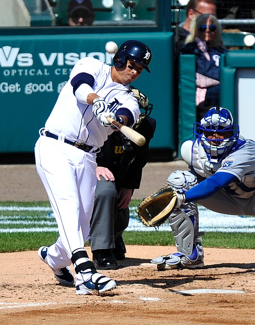 Tigers Victor Martinez launches a solo home run in the bottom of the second inning. Detroit Tigers Opening Day vs the Kansas City Royal at Comerica Park in Detroit, Michigan on March 31, 2014.
