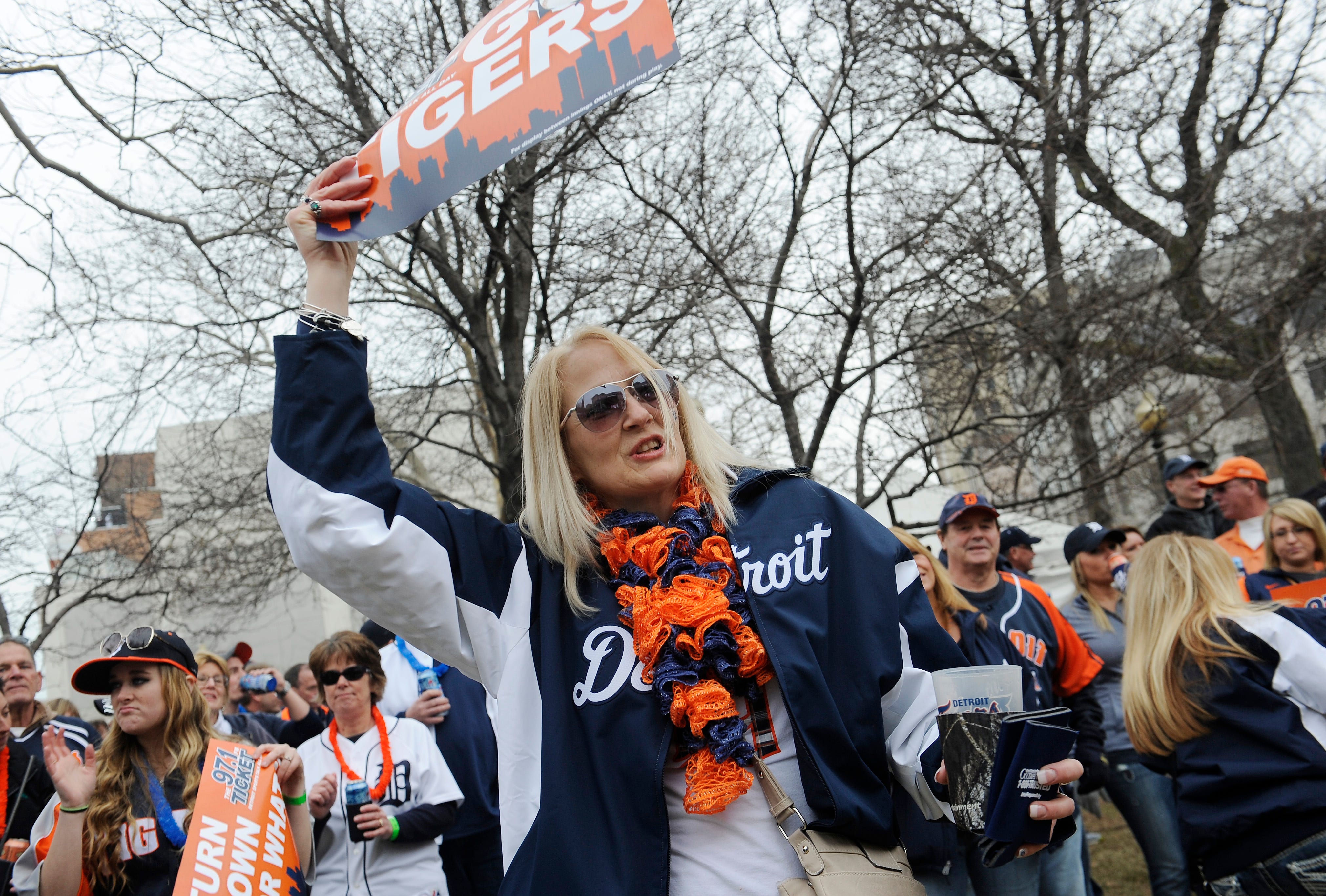 Barbara Miller, 45, of Brighton dances to the music at the Opening Day Block Party in Grand Circus park.Detroit Tigers Opening Day at Comerica Park, Detroit, MI.