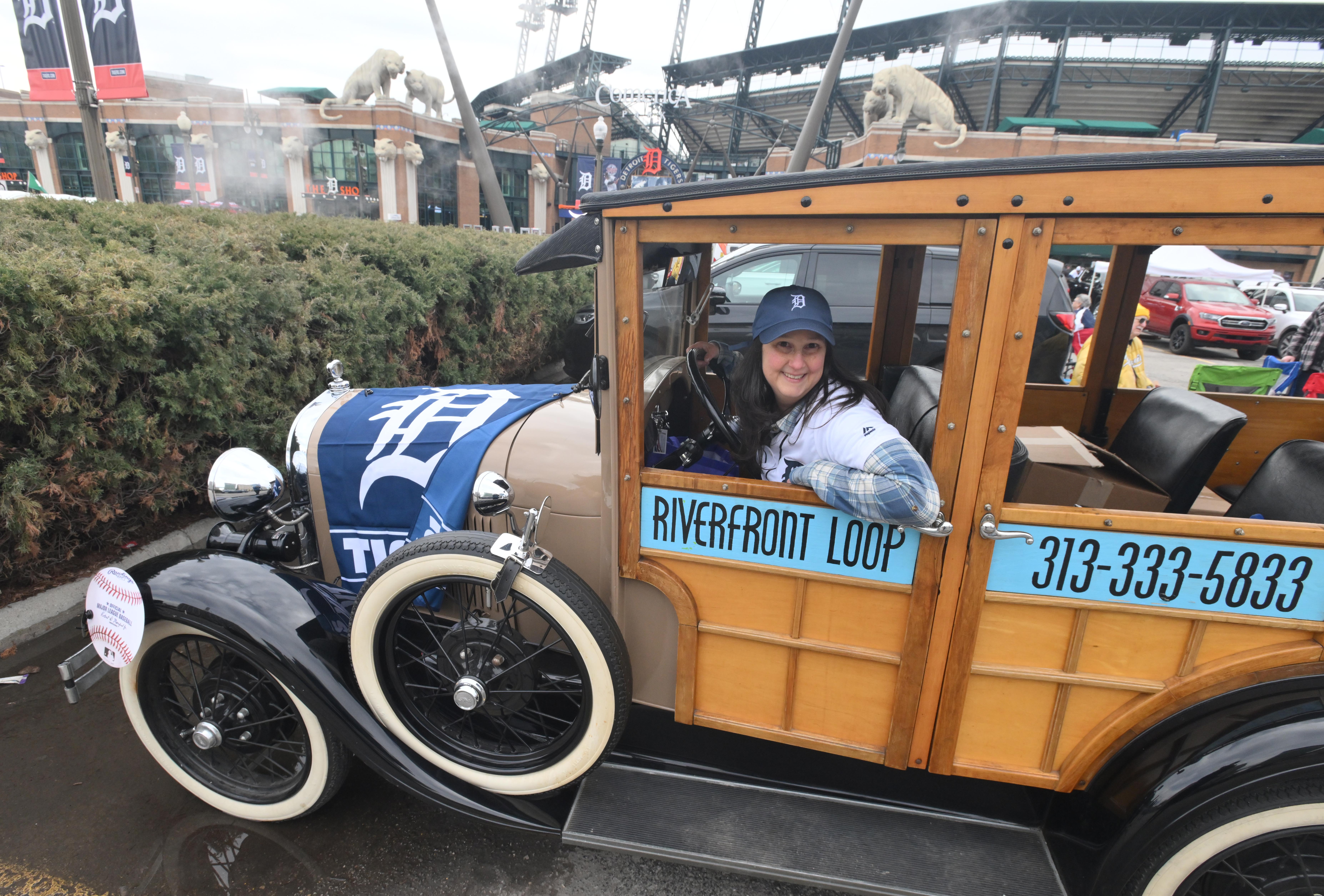 LIsa Stolarski of Antique Touring.com sits in style in front of Comerica Park before the Detroit Tigers opening day game. Detroit Tigers home opener at Comerica Park in Detroit, Michigan on April 6, 2023.