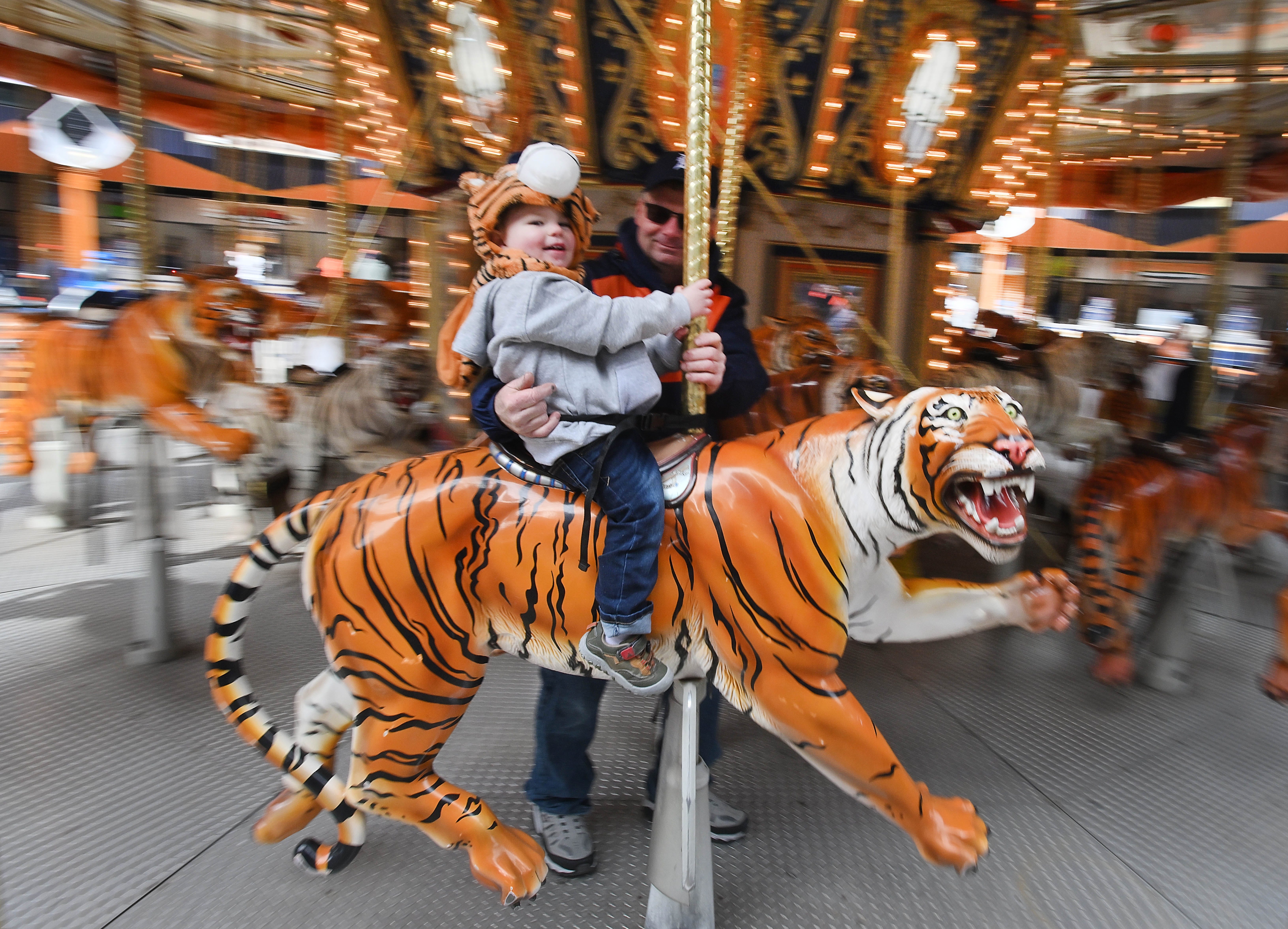 Larry Dick with grandson Franklin Hernandez, 2 on the merry-go-round at Comerica Park.
Detroit Tigers home opener at Comerica Park in Detroit, Michigan on April 6, 2023.