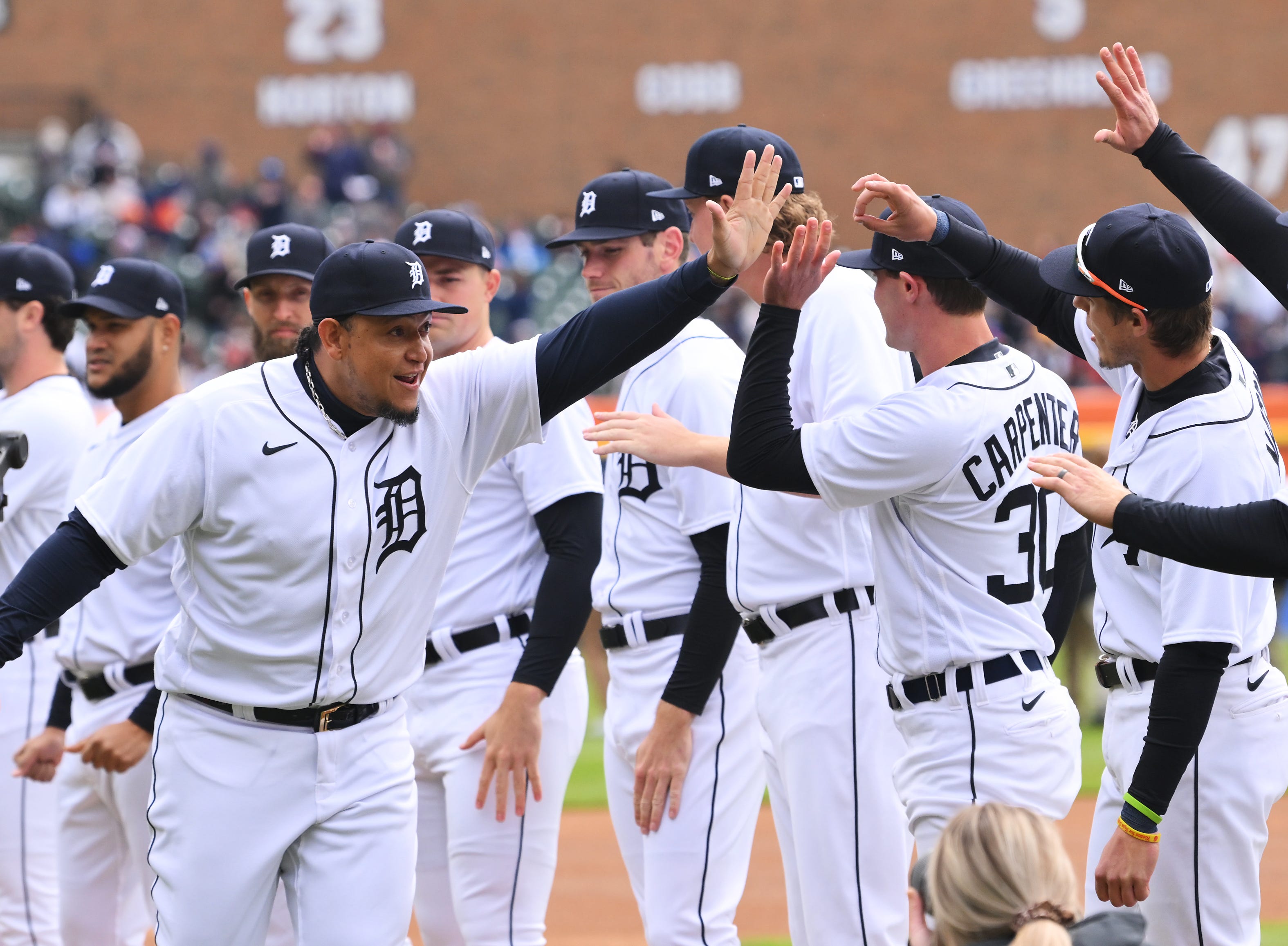 Tigers slugger Miguel Cabrera high fives teammates during pre-game introductions during his final home opener in Detroit. Tigers home opener against the Boston Red Sox in Detroit on Thursday, April 6, 2023.