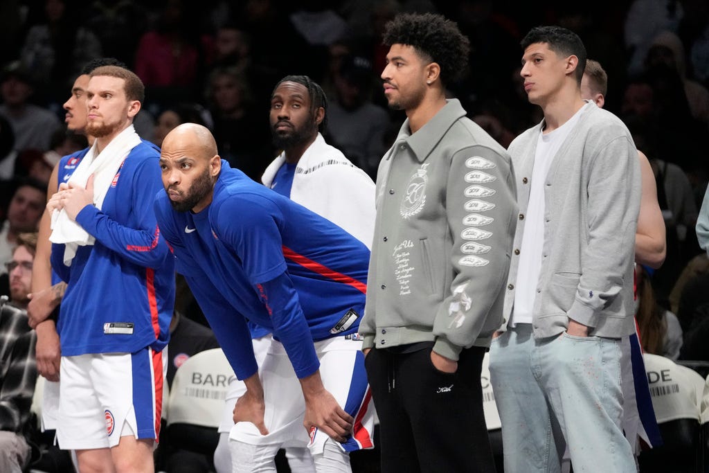 The Pistons' bench reacts during the final seconds in the second half against the Brooklyn Nets on Saturday in New York.