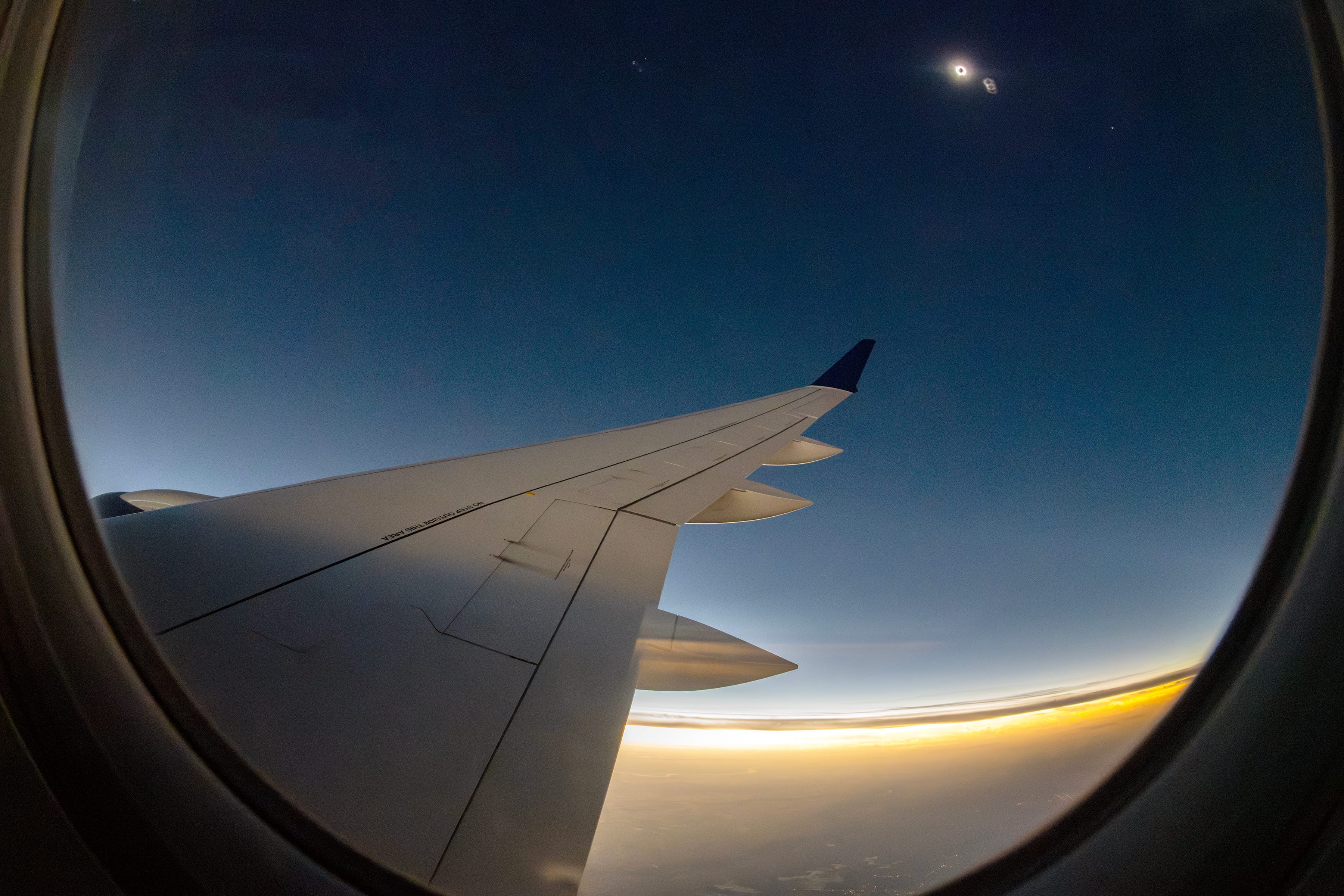 The total solar eclipse is shown from Delta Flight 1218 over Missouri, Monday, April 8, 2024. A special solar eclipse flight from Austin, Texas, to Detroit flew in the path of the total solar eclipse.