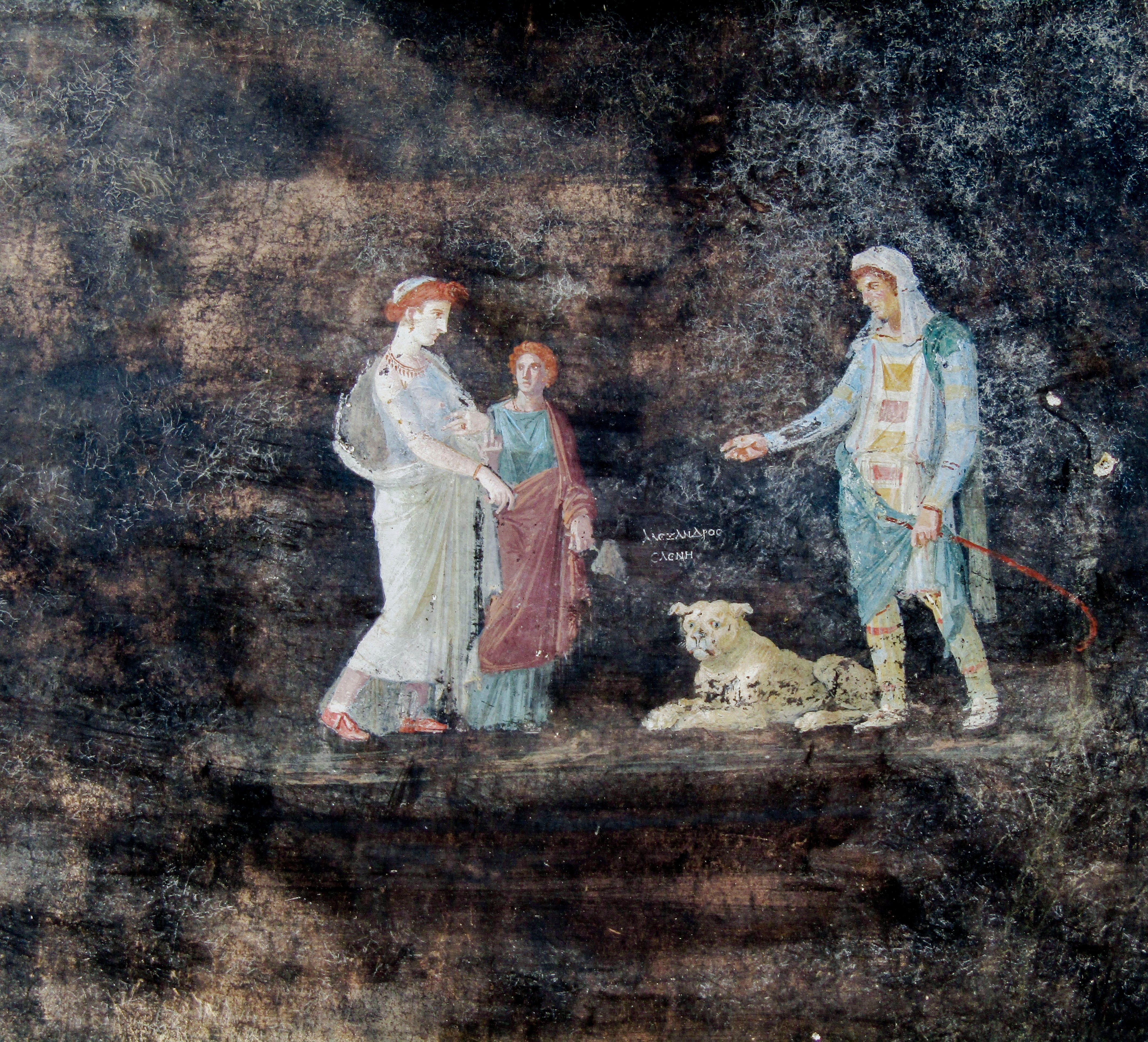 This image released by the Italian Culture Ministry on Wednesday, April 10, 2024, shows a fresco depicting the Greek mythology's figures of Helen, left, and Paris of Troy, right, inside an imposing banquet hall, with elegant black walls, decorated with mythological subjects inspired by the Trojan War.