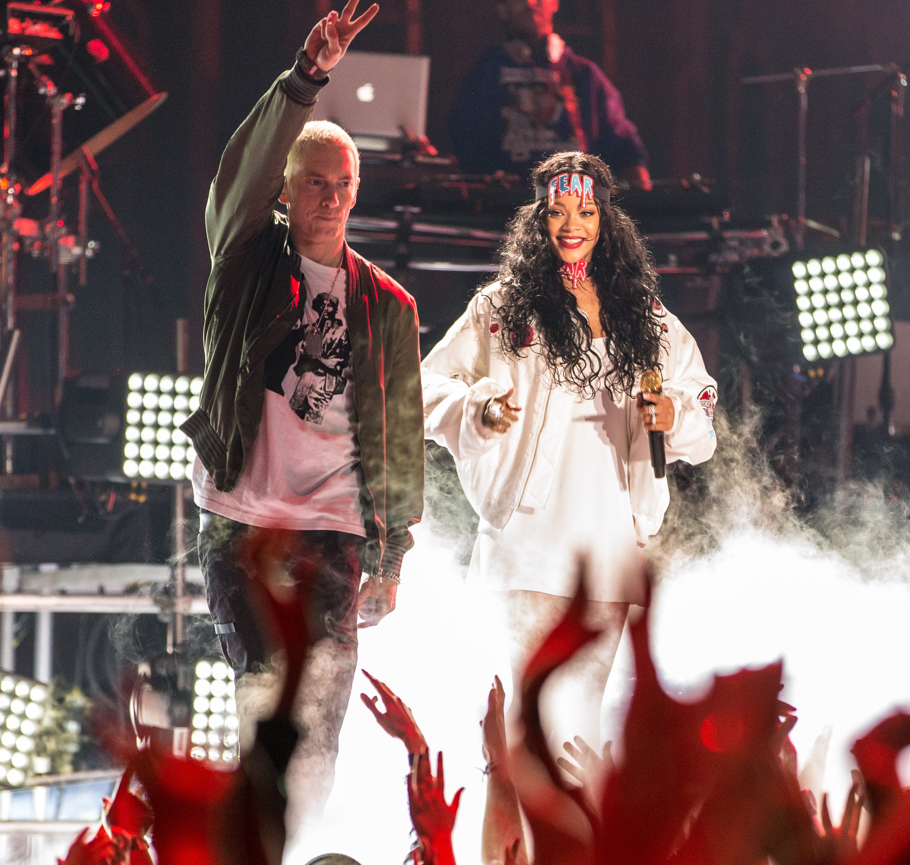 Eminem and Rihanna perform onstage at the 2014 MTV Movie Awards at Nokia Theatre L.A. Live on April 13, 2014 in Los Angeles, California.