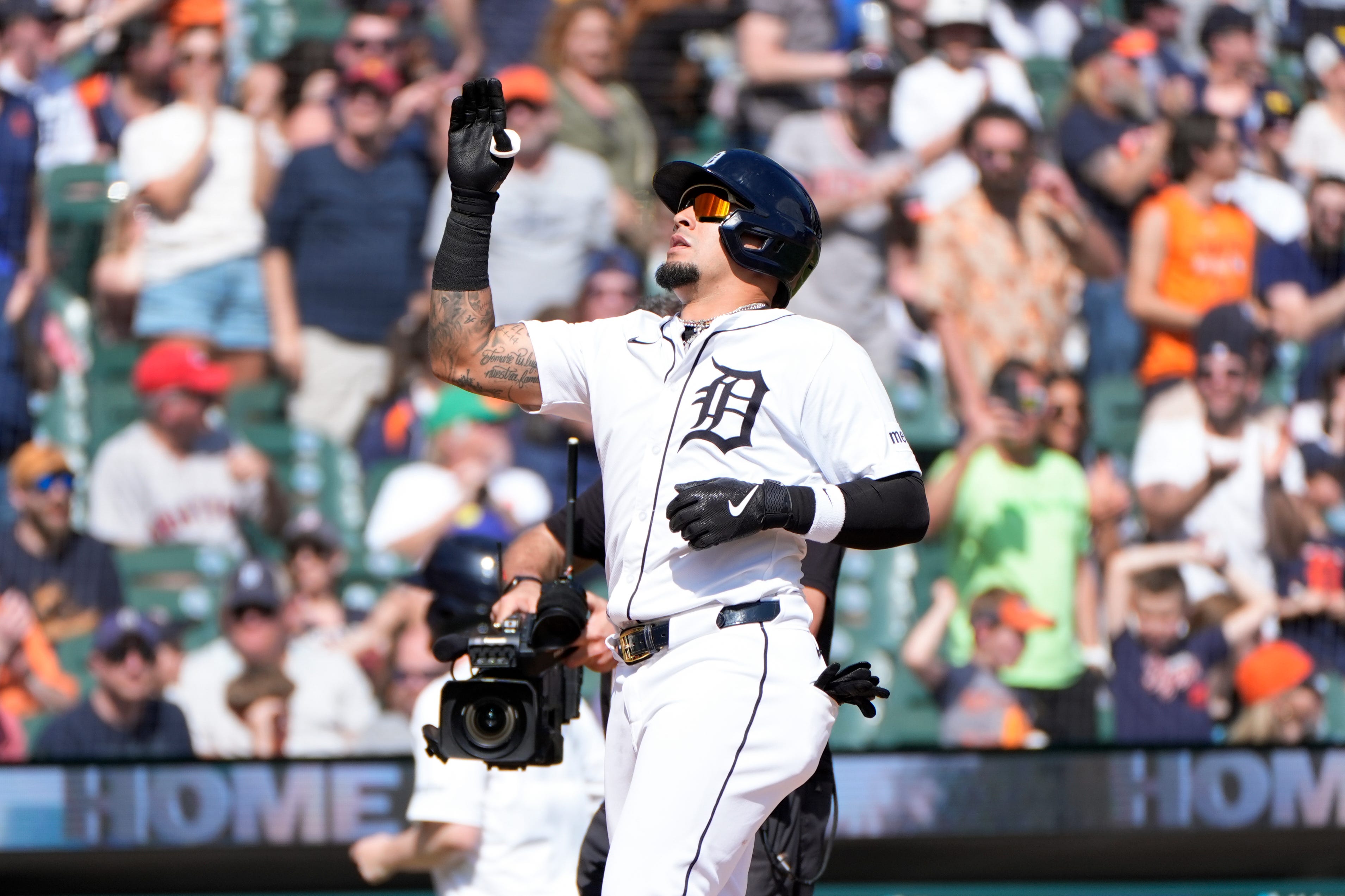 Detroit Tigers' Javier Báez celebrates his home run against the Minnesota Twins in the eighth inning of a baseball game, Sunday, April 14, 2024, in Detroit. (AP Photo/Paul Sancya)