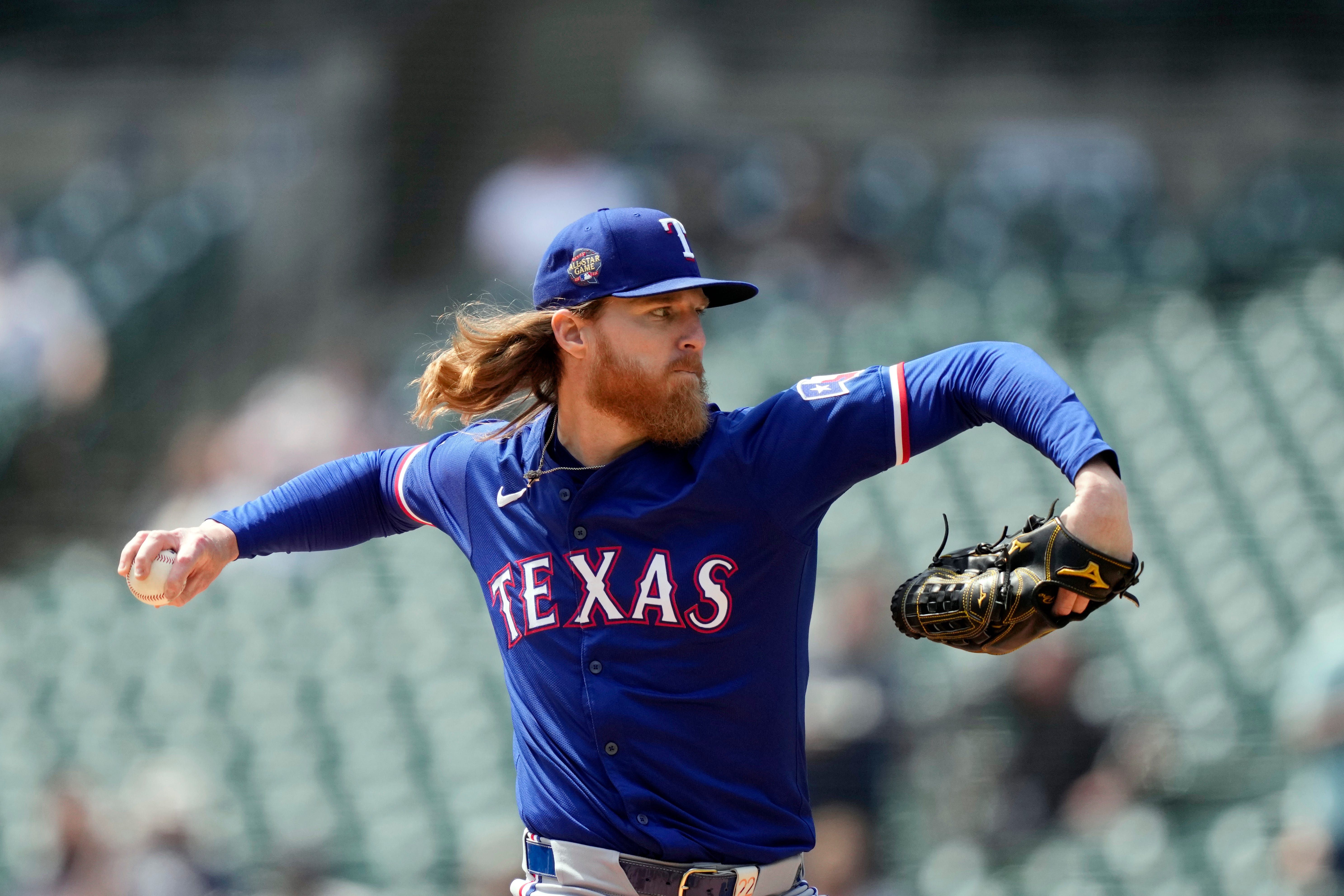 Texas Rangers pitcher Jon Gray throws during the first inning.