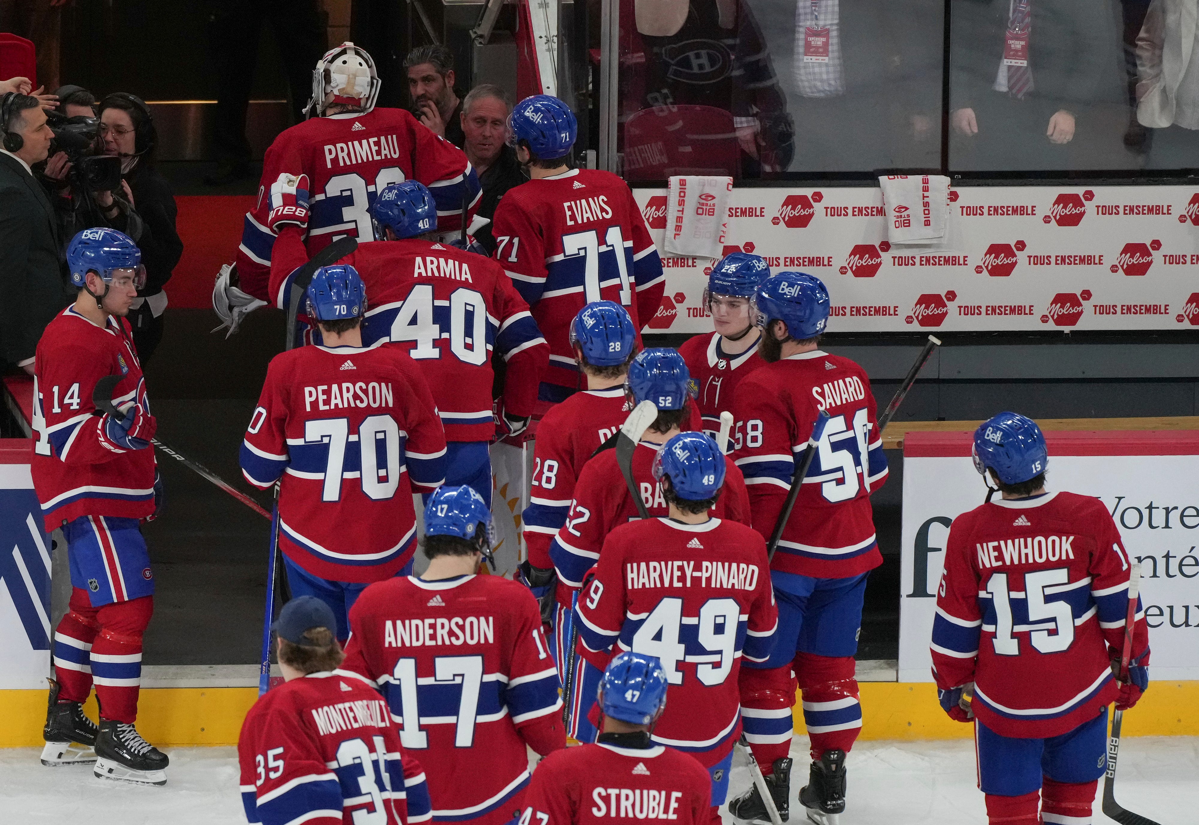 The Montreal Canadiens leave the ice following their shootout loss, 5 to 4, to the Detroit Red Wings.