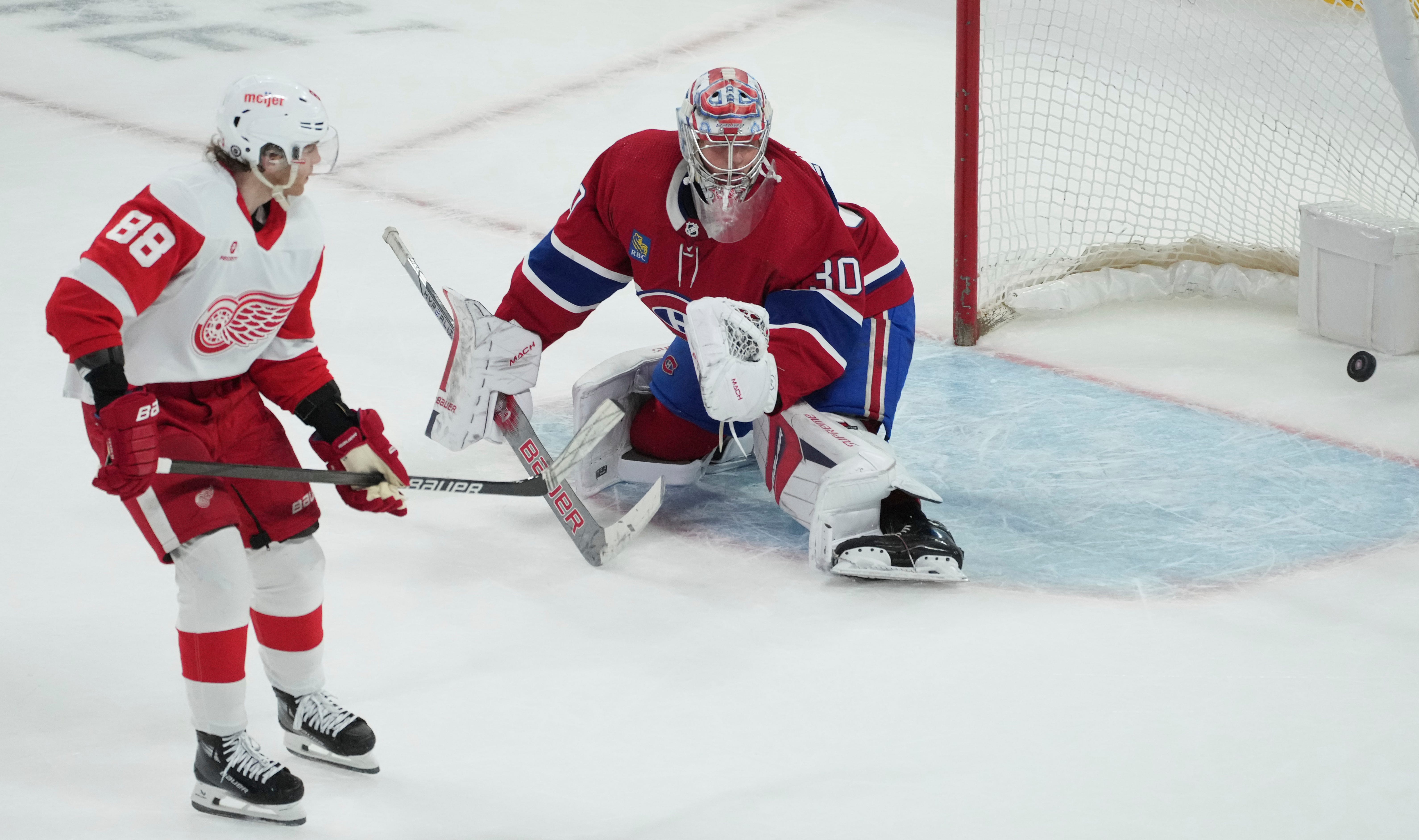 Detroit Red Wings' Patrick Kane (88) scores against Montreal Canadiens goaltender Cayden Primeau (30) during a shootout.