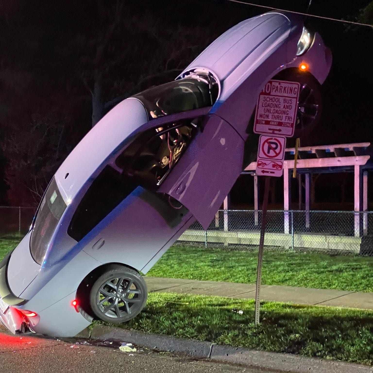 Ann Arbor police said officers found a car resting vertically early Friday when they responded to a report of a single-vehicle crash.