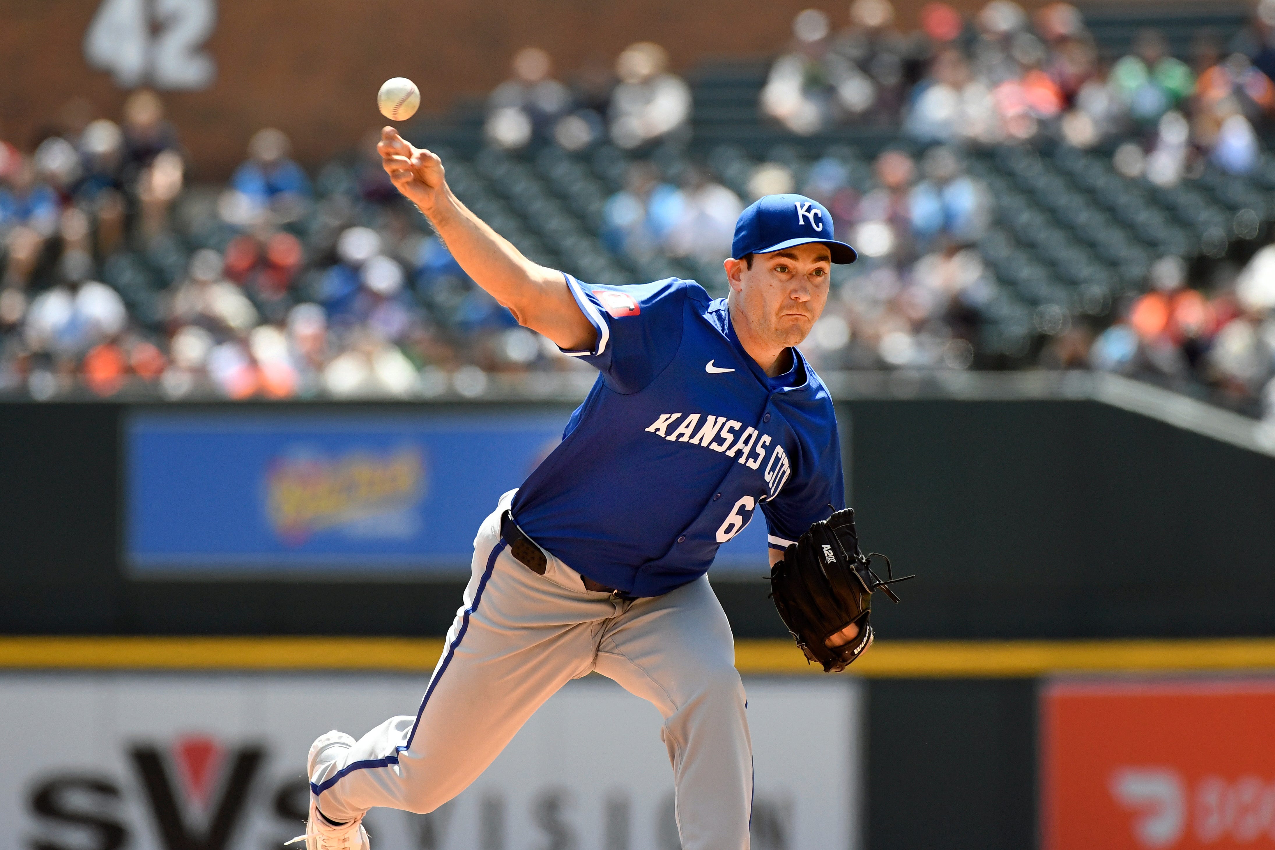 Royals starting pitcher Seth Lugo throws against the Tigers in the first inning.