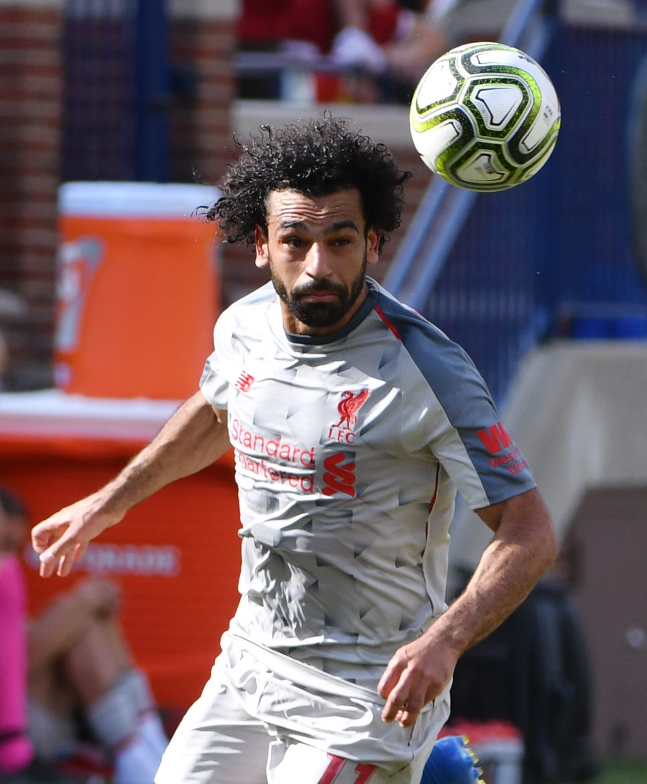 Liverpool's Mohamed Salah keeps an eye on the ball bringing it up field in the first half.