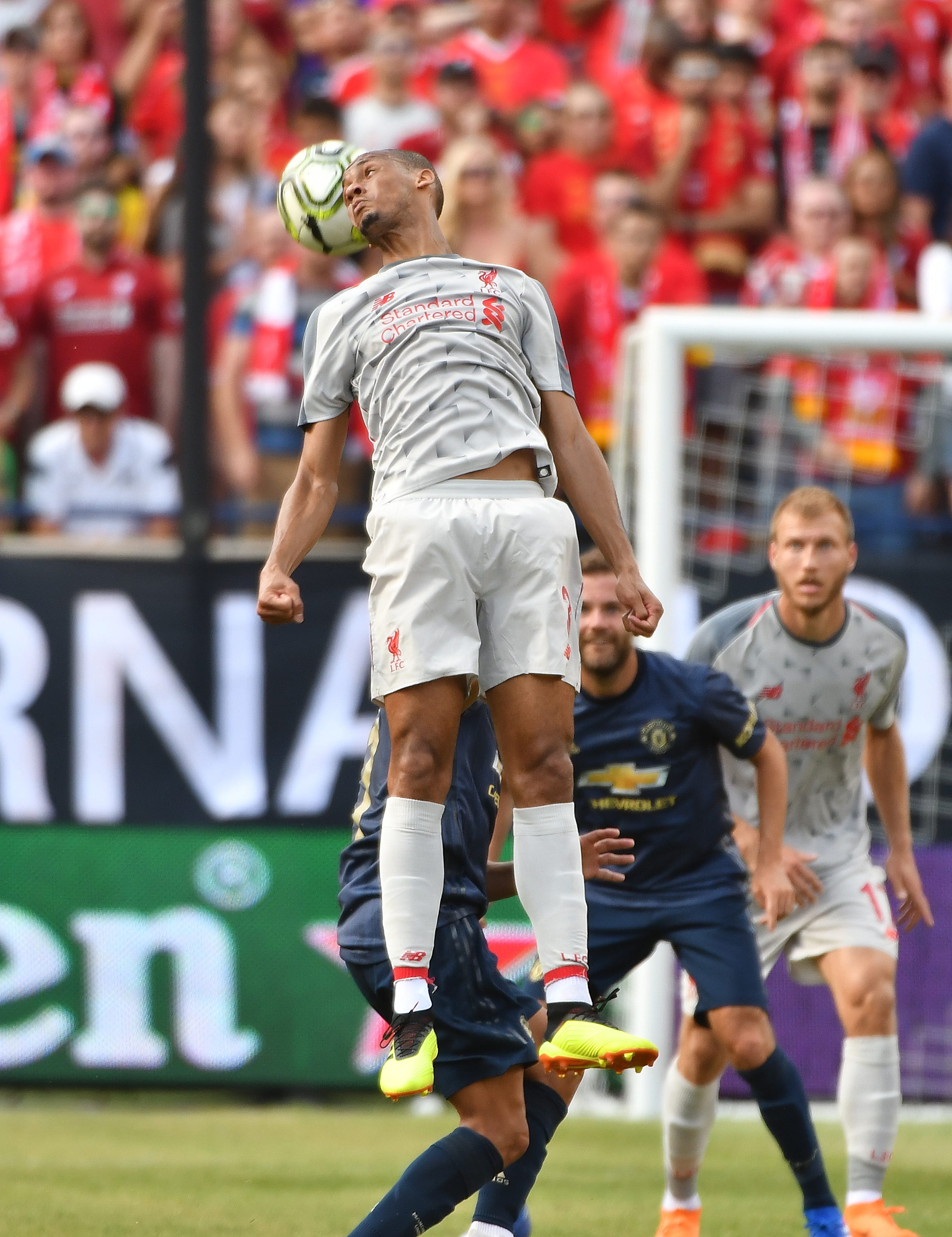 Liverpool's Fabinho heads back a ball in the first half.