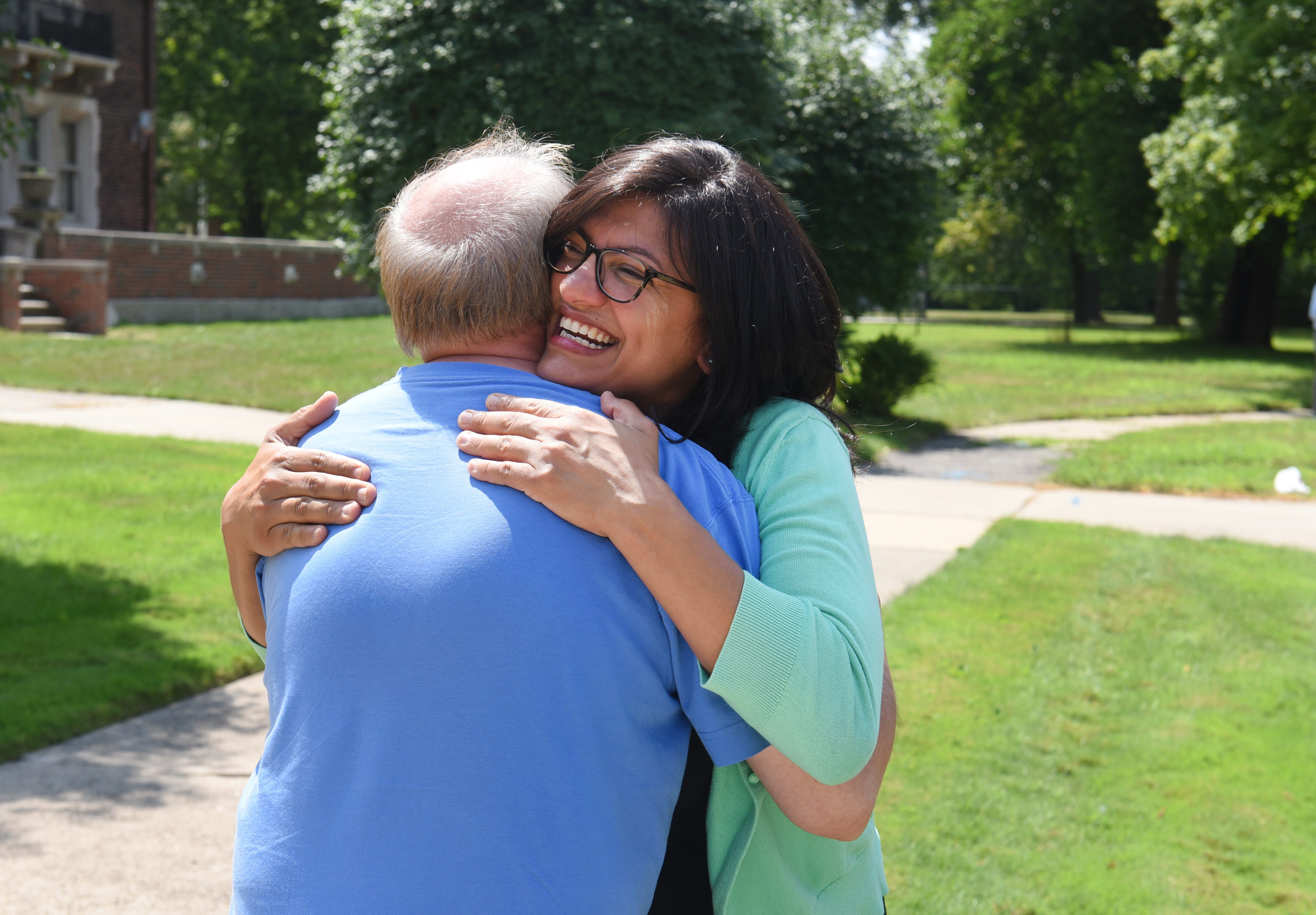 Rashida Tlaib is congratulated by a supporter after she was interviewed by local media on Wednesday, August 8, 2018 in Detroit about being the first Muslim woman elected to Congress.