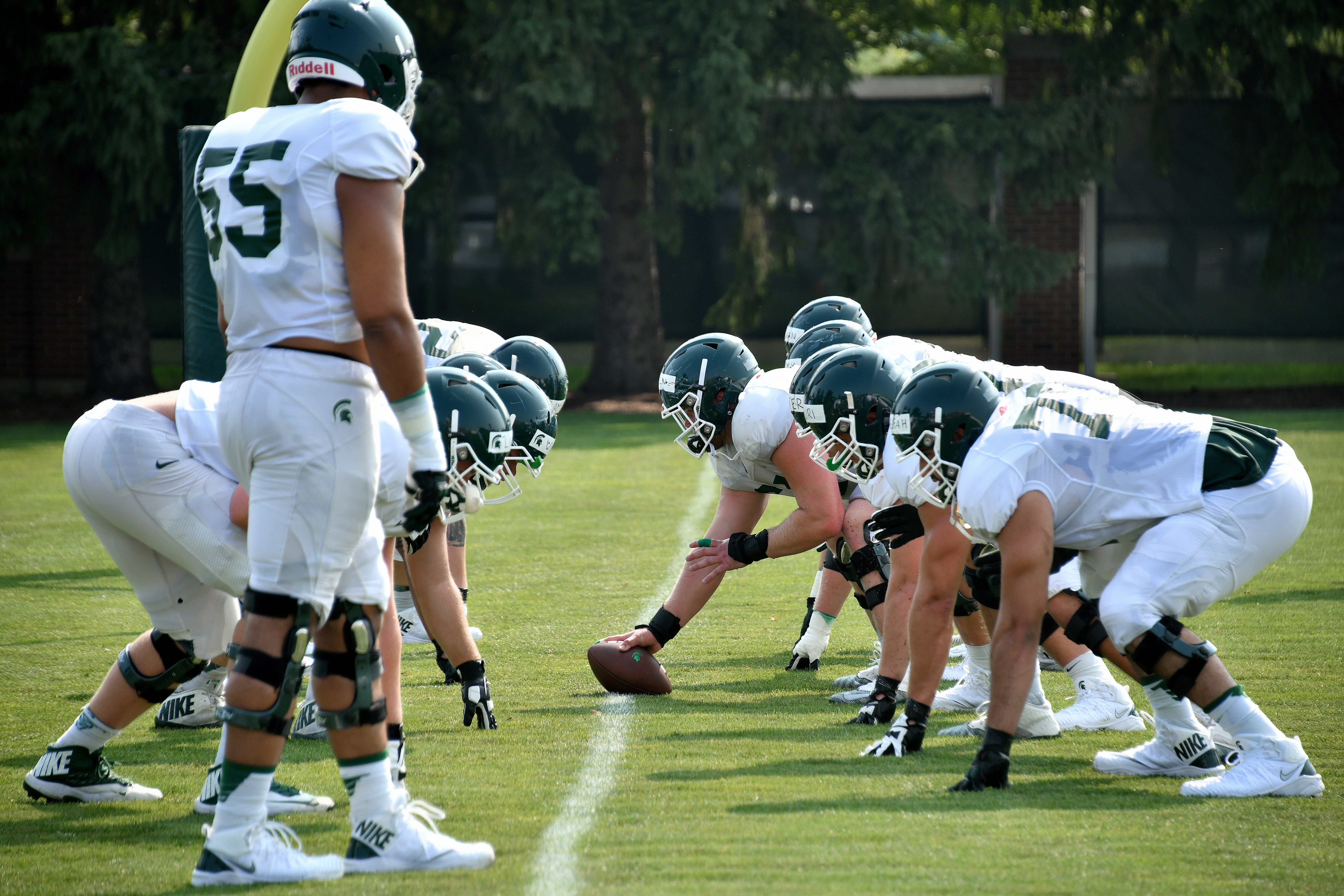 Michigan State's offensive line takes a snap after lining up against -- who else? --  more offensive linemen.