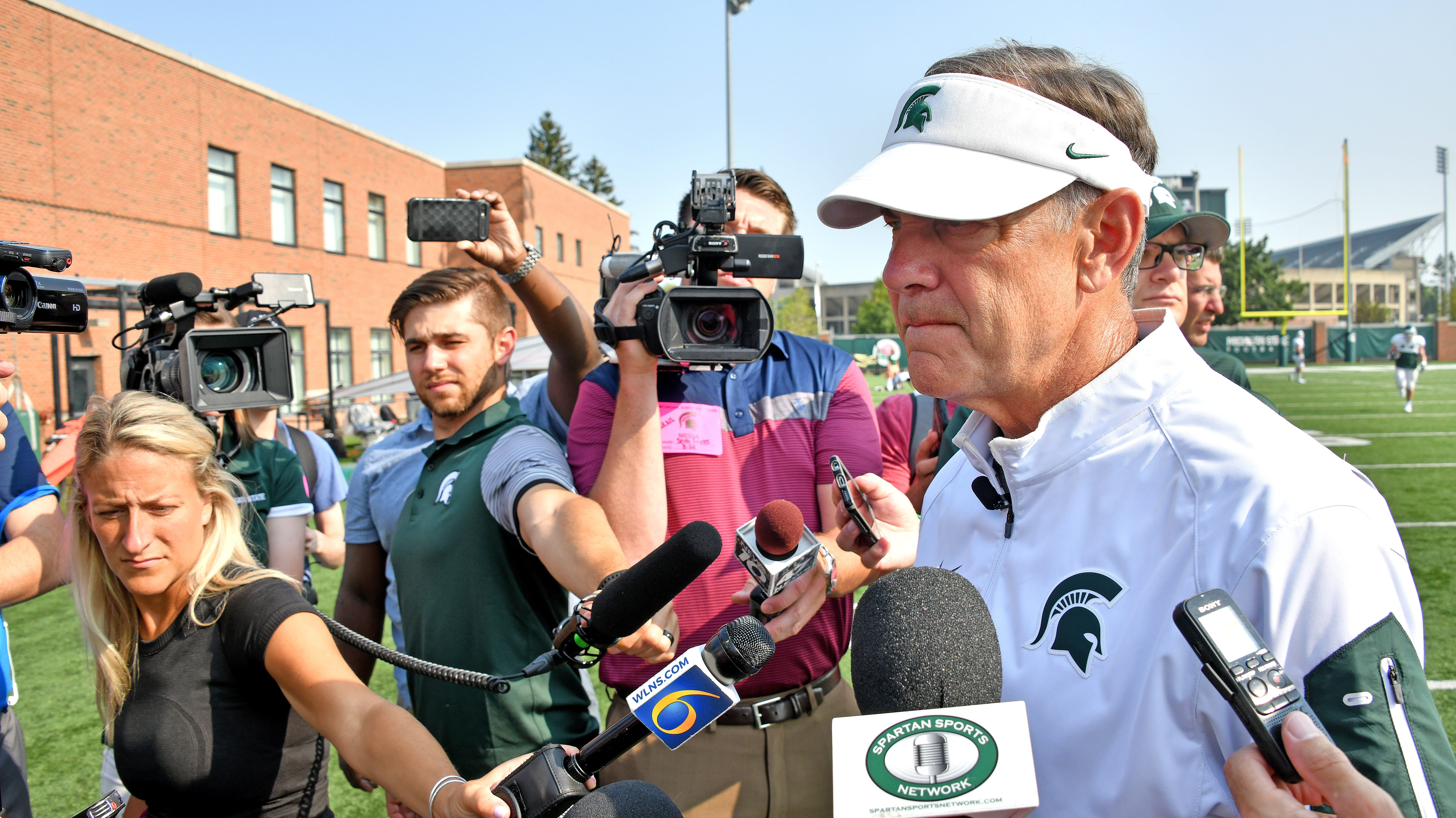 Michigan State head coach Mark Dantonio talks with the media before Tuesday morning's practice.