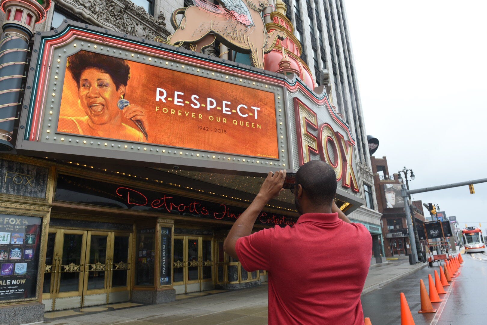 Robert Farnette of Detroit photographs a tribute to Aretha Franklin at the Fox Theatre on Thursday in Detroit.