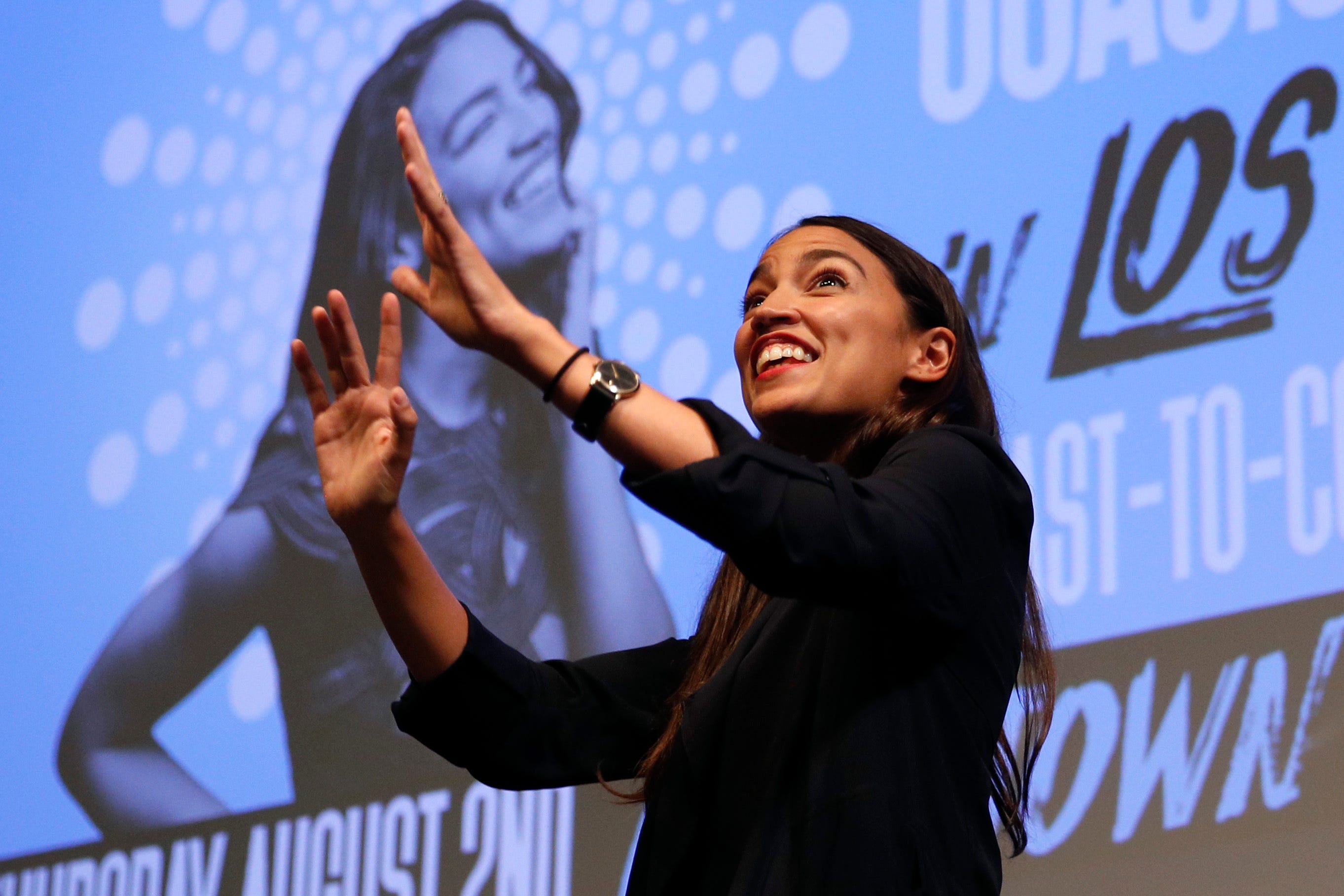 Alexandria Ocasio-Cortez, a winner of a Democratic Congressional primary in New York, acknowledges her supporters as she is introduced at a fundraiser Thursday, Aug. 2, 2018, in Los Angeles.