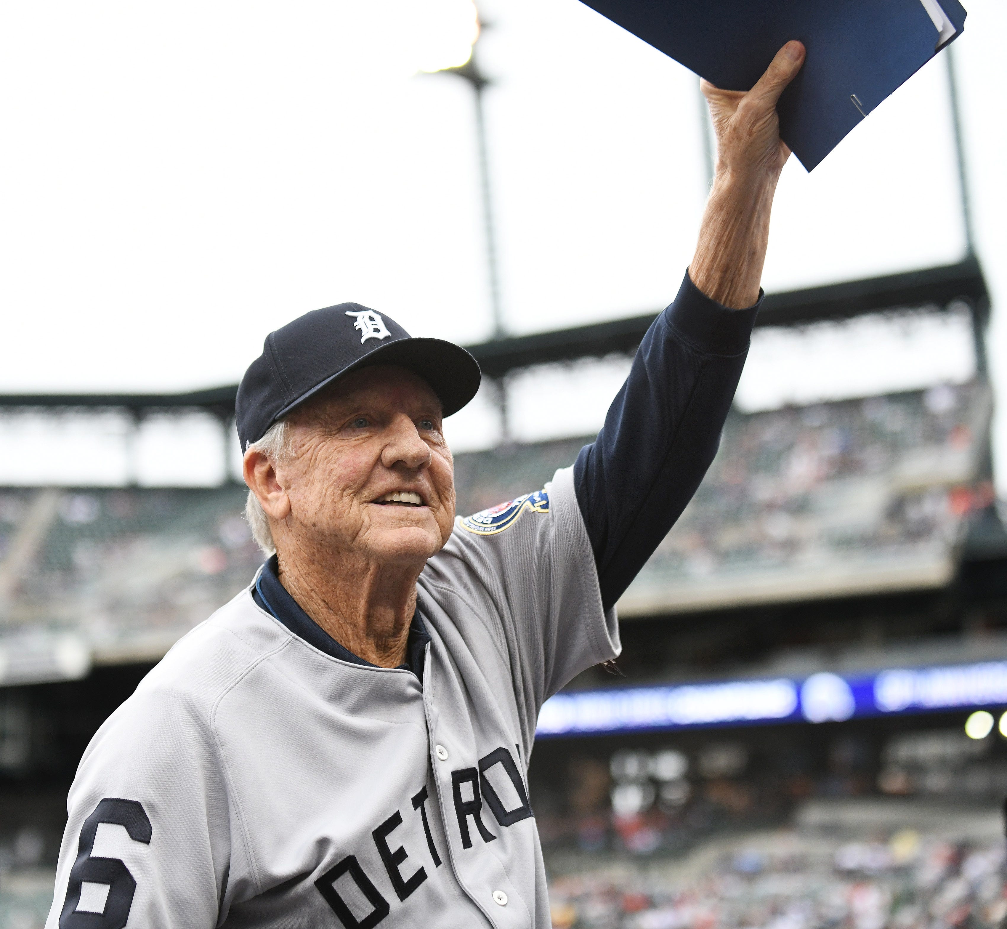 Al Kaline, Hall of Famer and member of the 1968 Tigers, waves to the crowd as he is introduced at Comerica Park in Detroit.