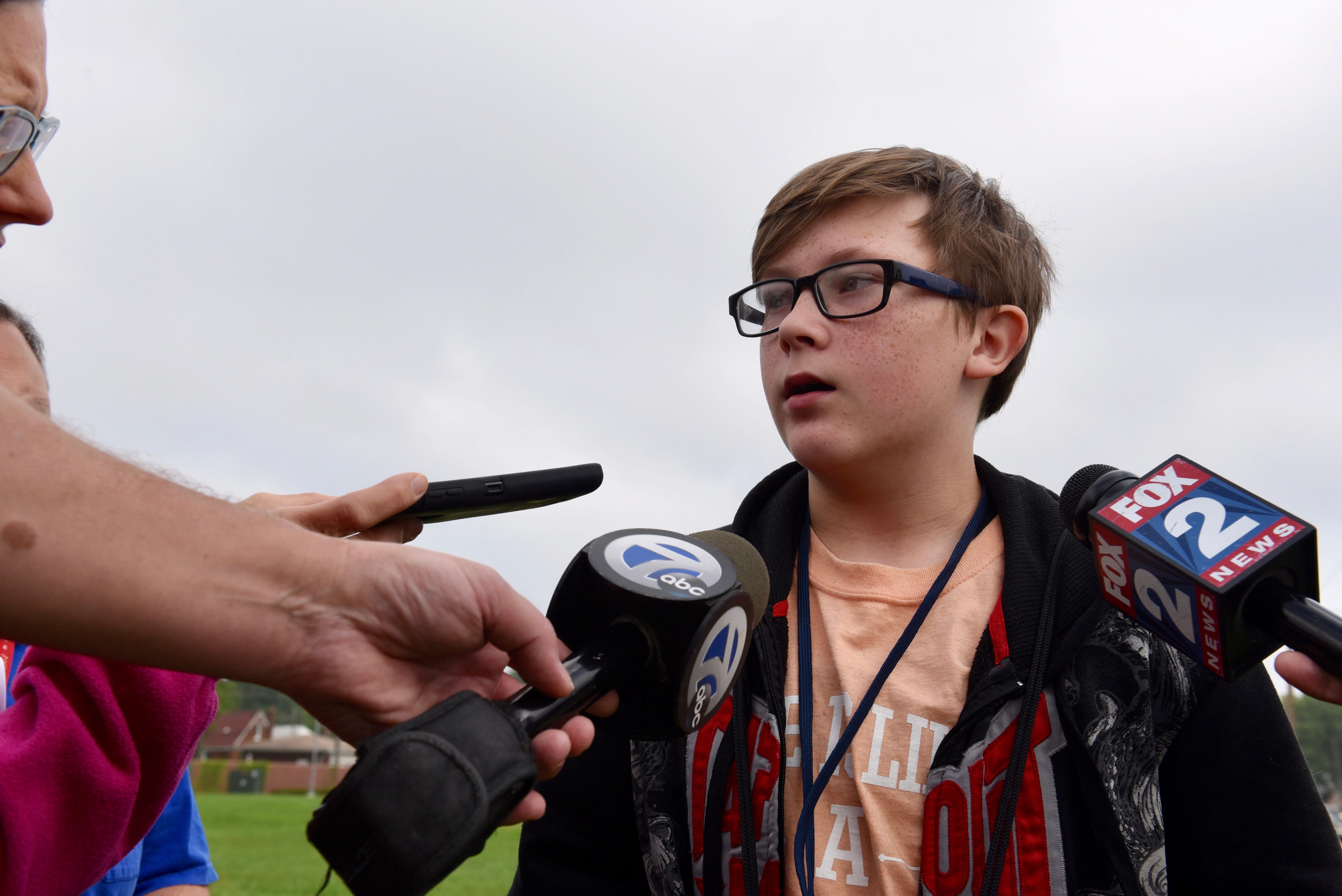 Warren Fitzgerald High School student Evan Lipscomb, 14,  said he was in band class when officials announced the school was on lockdown over the PA system. 
"The teacher started locking the doors," he said as he was walking home at about 10:30 after being released for the day.