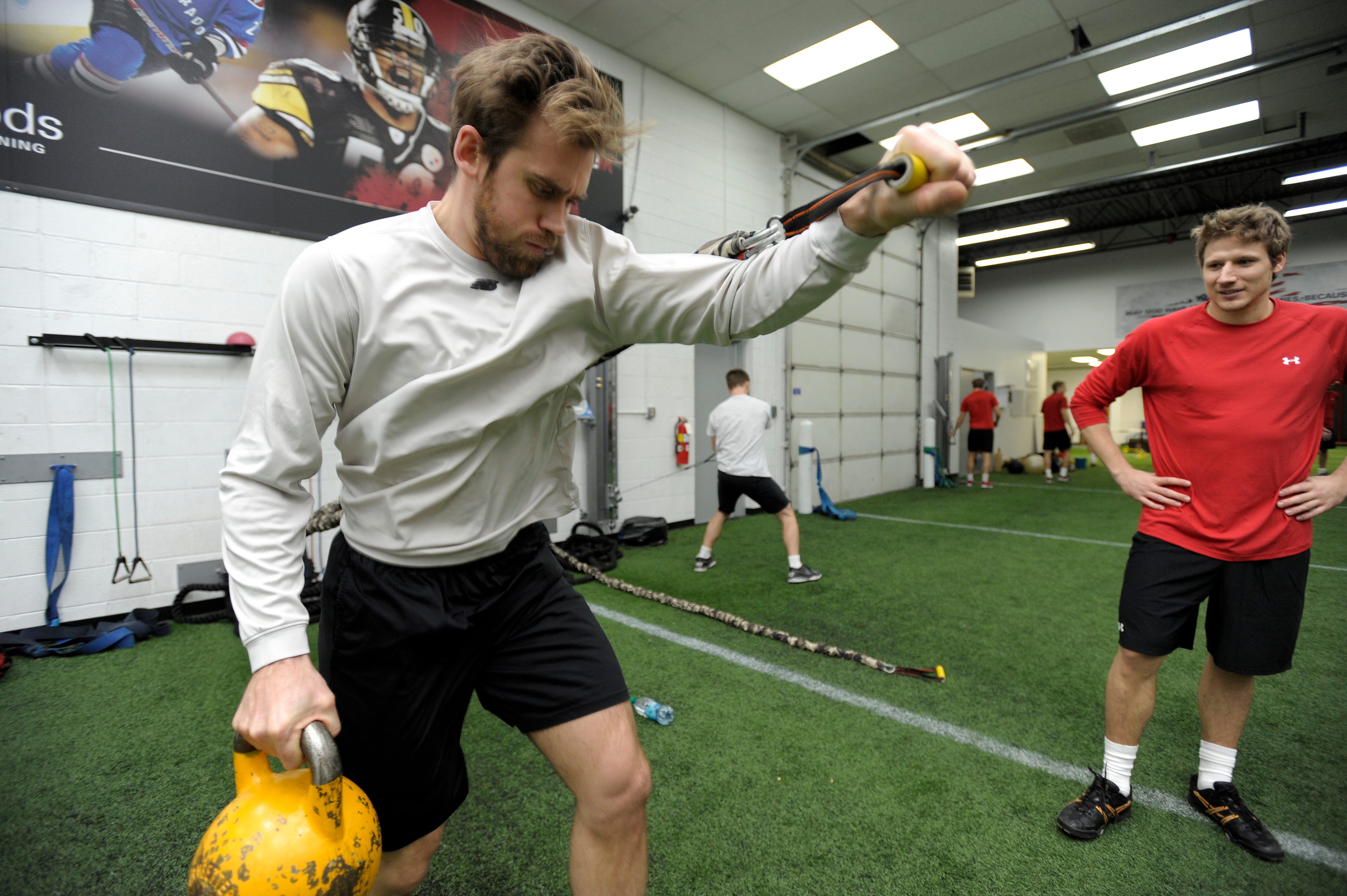 Henrik Zetterberg performs strength and conditioning exercises at Barwis Methods Training Center in Plymouth, January 14, 2013.