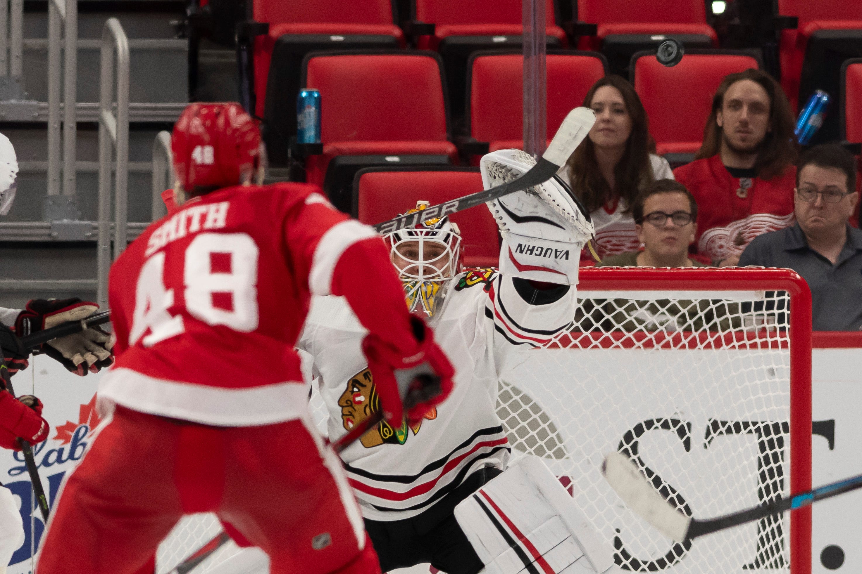 Detroit right wing Givani Smith tries to shoot the puck past Chicago goaltender Kevin Lankinen in the second period.