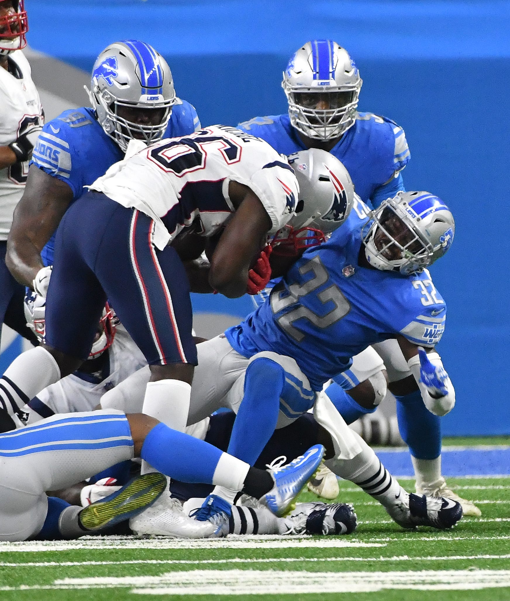 Lions ' Tavon Wilson pulls and the defense stops Patriots ' Sony Michel from making a first down on third-and-1 in the second quarter.