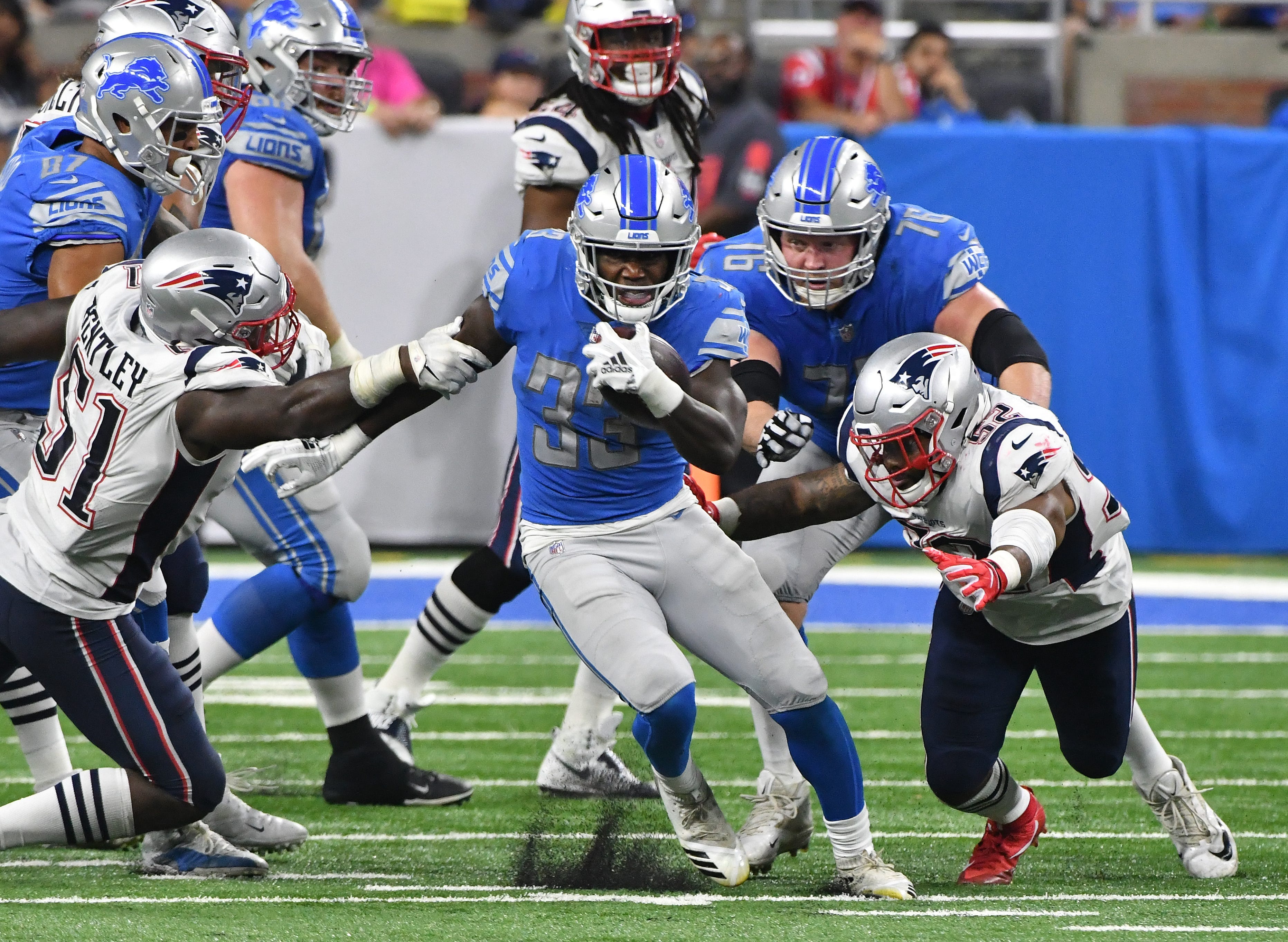 Lions running back Kerryon Johnson breaks up field for a first-down run in the third quarter.