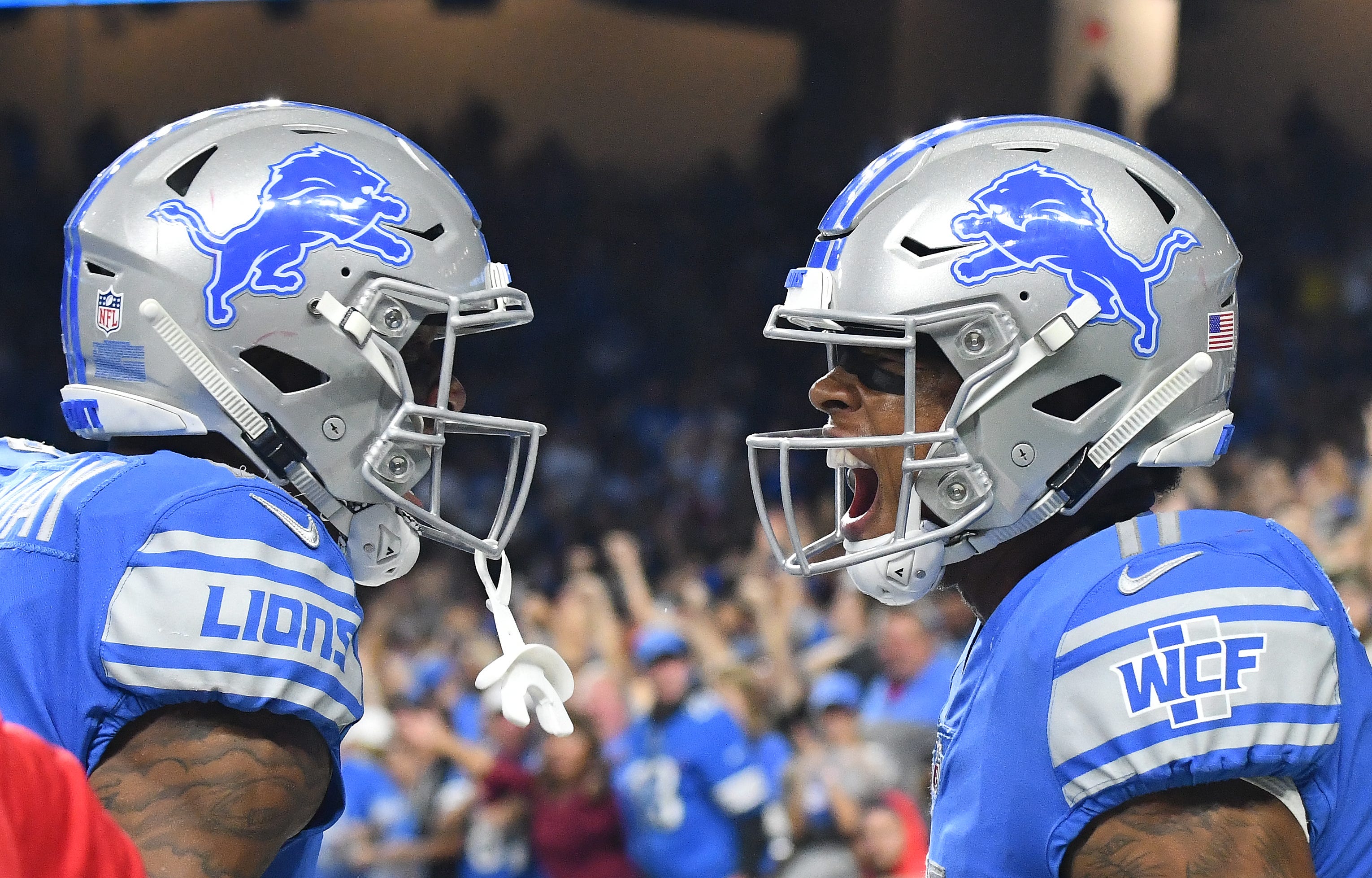 Kenny Golladay celebrates with Lions teammate Marvin Jones Jr. after Jones ' touchdown reception in the third quarter.
